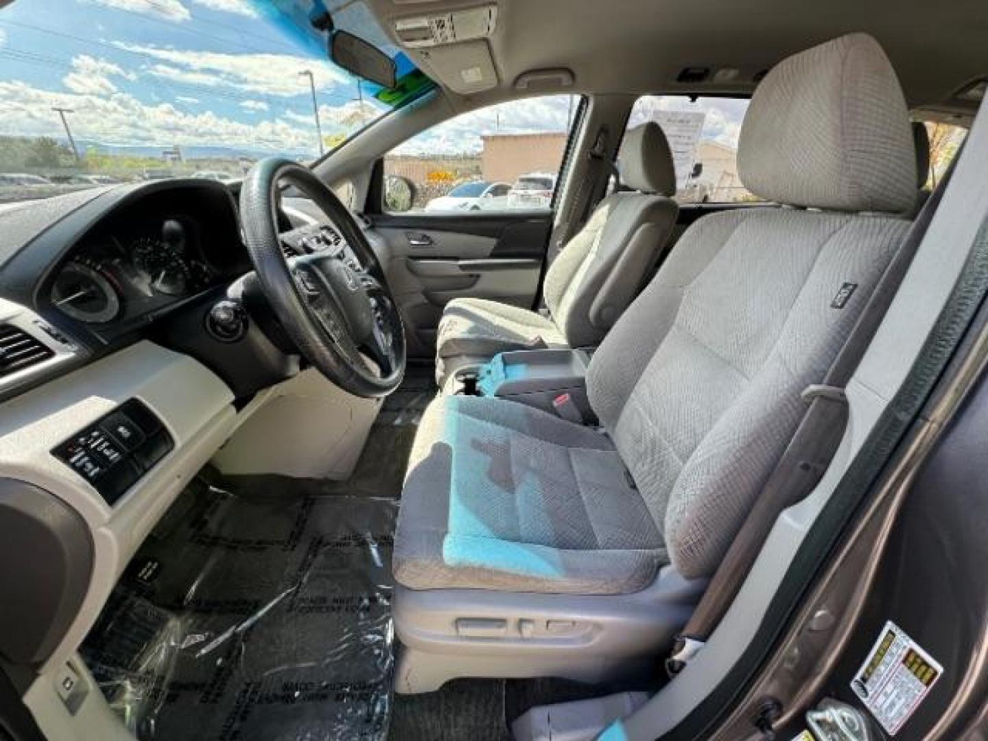2015 Alabaster Silver Metallic Honda Odyssey EX (5FNRL5H46FB) with an 3.5L V6 SOHC 24V engine, 6-Speed Automatic transmission, located at 940 North Main Street, Cedar City, UT, 84720, (435) 628-0023, 37.692936, -113.061897 - We specialize in helping ALL people get the best financing available. No matter your credit score, good, bad or none we can get you an amazing rate. Had a bankruptcy, divorce, or repossessions? We give you the green light to get your credit back on the road. Low down and affordable payments that fit - Photo#18