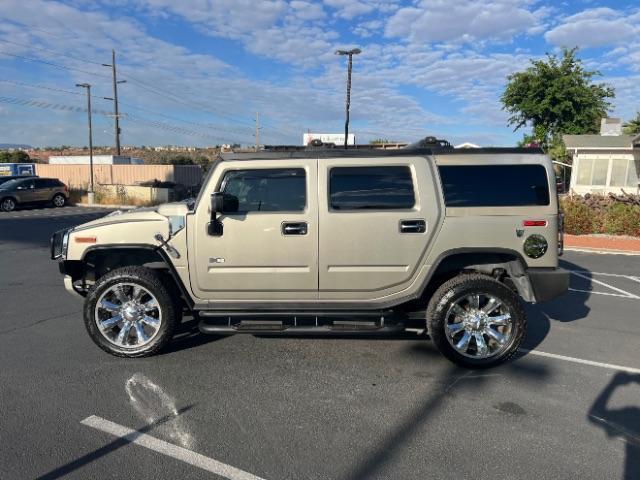 2003 Pewter Metallic /Wheat Leather Interior Hummer H2 Sport Utility (5GRGN23U73H) with an 6.0L V8 OHV 16V engine, 4-Speed Automatic transmission, located at 1865 East Red Hills Pkwy, St. George, 84770, (435) 628-0023, 37.120850, -113.543640 - We specialize in helping ALL people get the best financing available. No matter your credit score, good, bad or none we can get you an amazing rate. Had a bankruptcy, divorce, or repossessions? We give you the green light to get your credit back on the road. Low down and affordable payments that fit - Photo#3