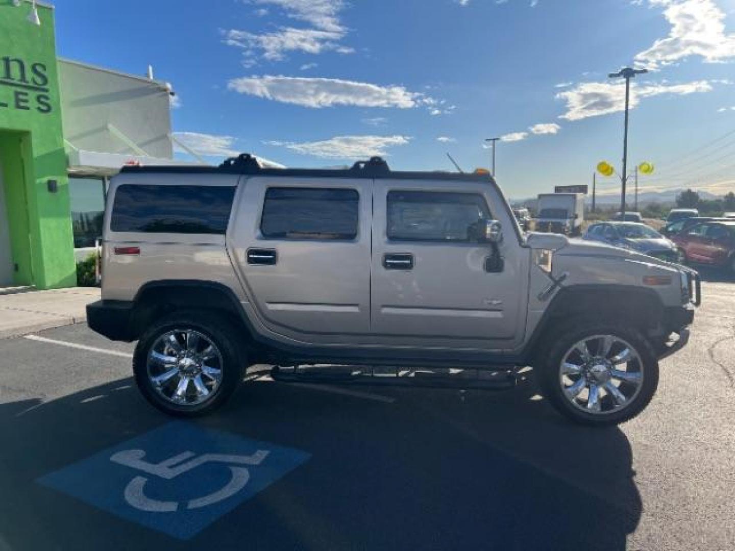 2003 Pewter Metallic /Wheat Leather Interior Hummer H2 Sport Utility (5GRGN23U73H) with an 6.0L V8 OHV 16V engine, 4-Speed Automatic transmission, located at 1865 East Red Hills Pkwy, St. George, 84770, (435) 628-0023, 37.120850, -113.543640 - Versatile Southern Utah travel starts with this 2003 Hummer H2 Sport Utility. Its 6.0L V8, 4-speed automatic transmission, and full-time four-wheel drive make it a smart fit for off-road trails, towing, and weekend adventures. With 142,613 miles, this H2 is ready for its next adventure. The Sport U- Photo#7