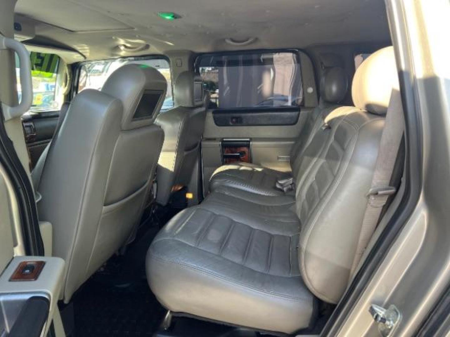 2003 Pewter Metallic /Wheat Leather Interior Hummer H2 Sport Utility (5GRGN23U73H) with an 6.0L V8 OHV 16V engine, 4-Speed Automatic transmission, located at 1865 East Red Hills Pkwy, St. George, 84770, (435) 628-0023, 37.120850, -113.543640 - Versatile Southern Utah travel starts with this 2003 Hummer H2 Sport Utility. Its 6.0L V8, 4-speed automatic transmission, and full-time four-wheel drive make it a smart fit for off-road trails, towing, and weekend adventures. With 142,613 miles, this H2 is ready for its next adventure. The Sport U- Photo#21