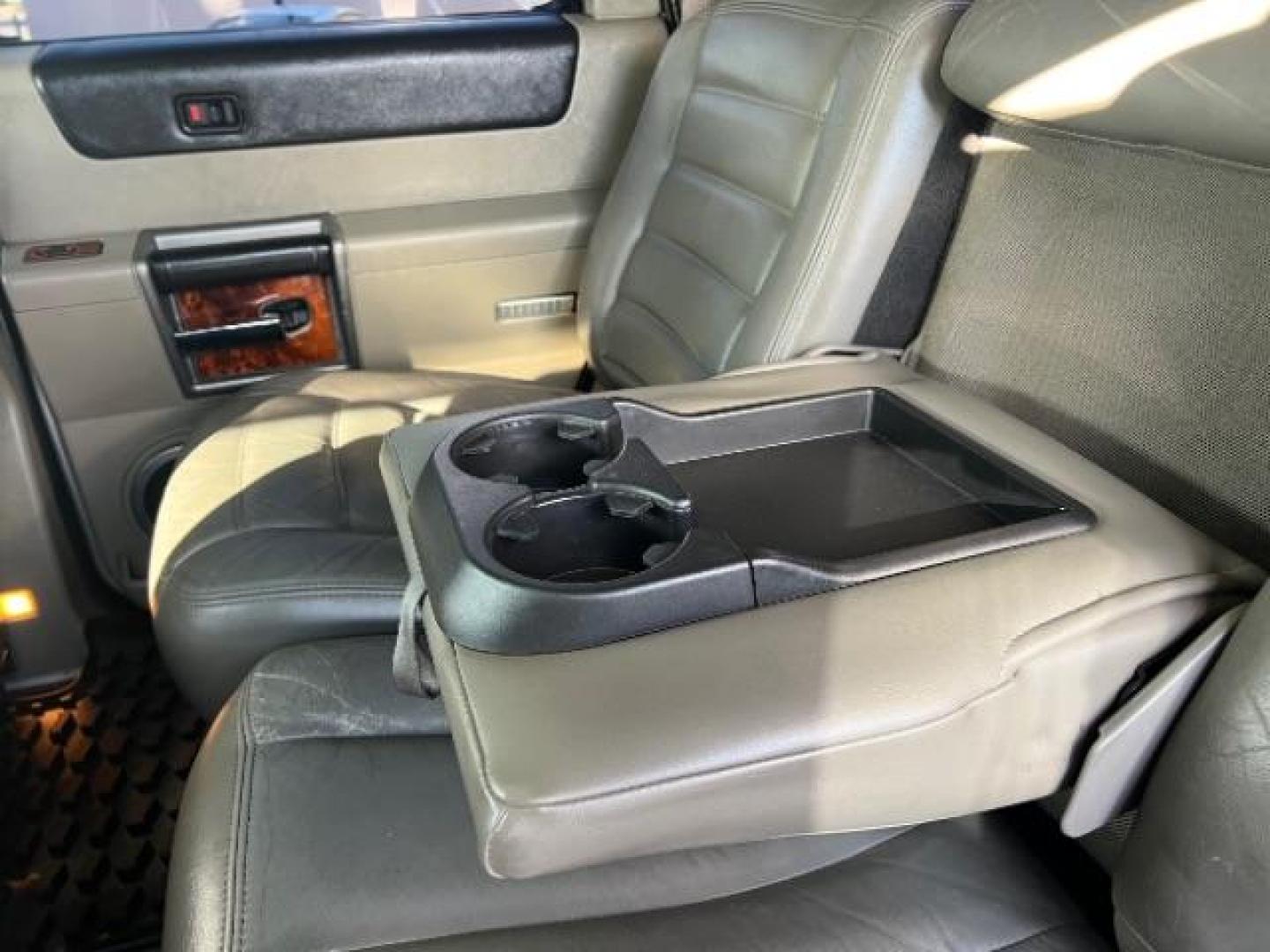 2003 Pewter Metallic /Wheat Leather Interior Hummer H2 Sport Utility (5GRGN23U73H) with an 6.0L V8 OHV 16V engine, 4-Speed Automatic transmission, located at 1865 East Red Hills Pkwy, St. George, 84770, (435) 628-0023, 37.120850, -113.543640 - Versatile Southern Utah travel starts with this 2003 Hummer H2 Sport Utility. Its 6.0L V8, 4-speed automatic transmission, and full-time four-wheel drive make it a smart fit for off-road trails, towing, and weekend adventures. With 142,613 miles, this H2 is ready for its next adventure. The Sport U- Photo#22