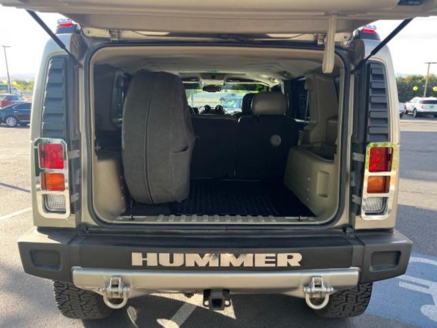 2003 Pewter Metallic /Wheat Leather Interior Hummer H2 Sport Utility (5GRGN23U73H) with an 6.0L V8 OHV 16V engine, 4-Speed Automatic transmission, located at 1865 East Red Hills Pkwy, St. George, 84770, (435) 628-0023, 37.120850, -113.543640 - Versatile Southern Utah travel starts with this 2003 Hummer H2 Sport Utility. Its 6.0L V8, 4-speed automatic transmission, and full-time four-wheel drive make it a smart fit for off-road trails, towing, and weekend adventures. With 142,613 miles, this H2 is ready for its next adventure. The Sport U- Photo#25