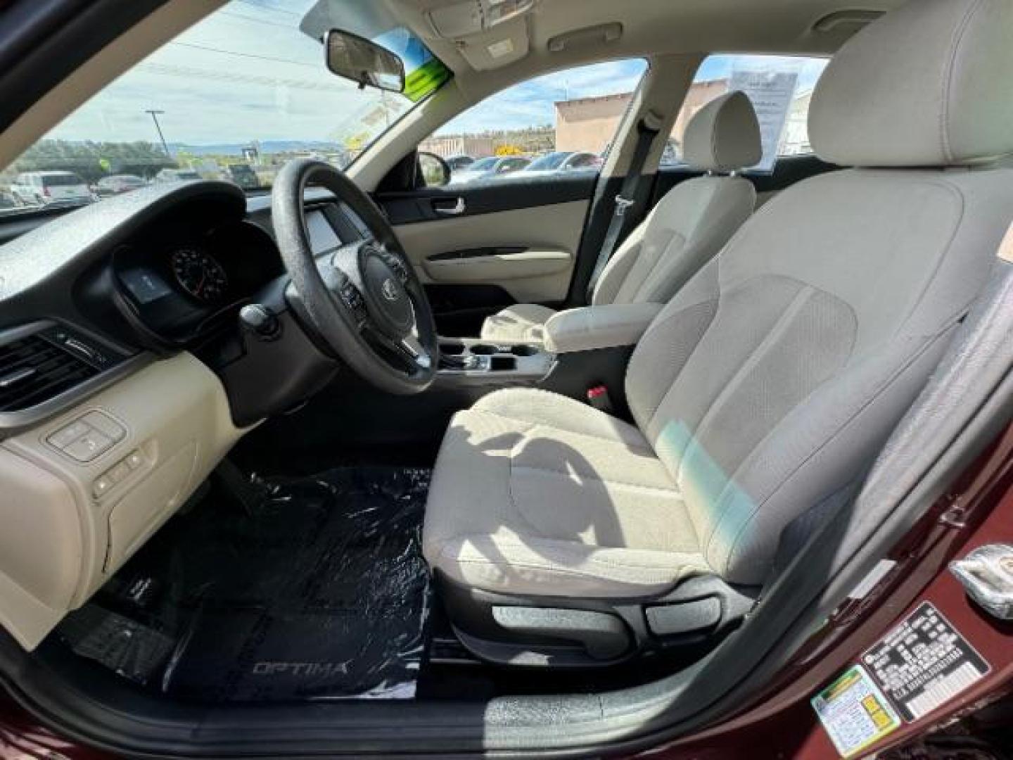 2018 Sangria /Beige Cloth, cloth Kia Optima LX (5XXGT4L33JG) with an 2.4L L4 DOHC 16V engine, 6-Speed Automatic transmission, located at 940 North Main Street, Cedar City, UT, 84720, (435) 628-0023, 37.692936, -113.061897 - We specialize in helping ALL people get the best financing available. No matter your credit score, good, bad or none we can get you an amazing rate. Had a bankruptcy, divorce, or repossessions? We give you the green light to get your credit back on the road. Low down and affordable payments that fit - Photo#17