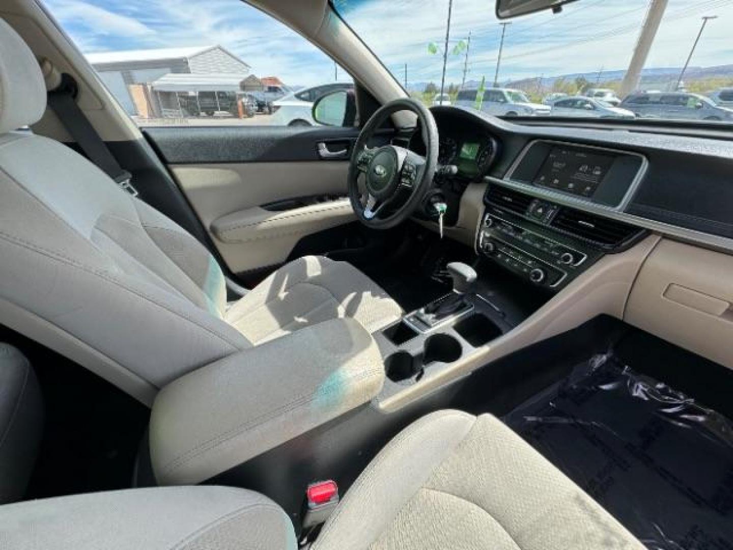 2018 Sangria /Beige Cloth, cloth Kia Optima LX (5XXGT4L33JG) with an 2.4L L4 DOHC 16V engine, 6-Speed Automatic transmission, located at 940 North Main Street, Cedar City, UT, 84720, (435) 628-0023, 37.692936, -113.061897 - We specialize in helping ALL people get the best financing available. No matter your credit score, good, bad or none we can get you an amazing rate. Had a bankruptcy, divorce, or repossessions? We give you the green light to get your credit back on the road. Low down and affordable payments that fit - Photo#32
