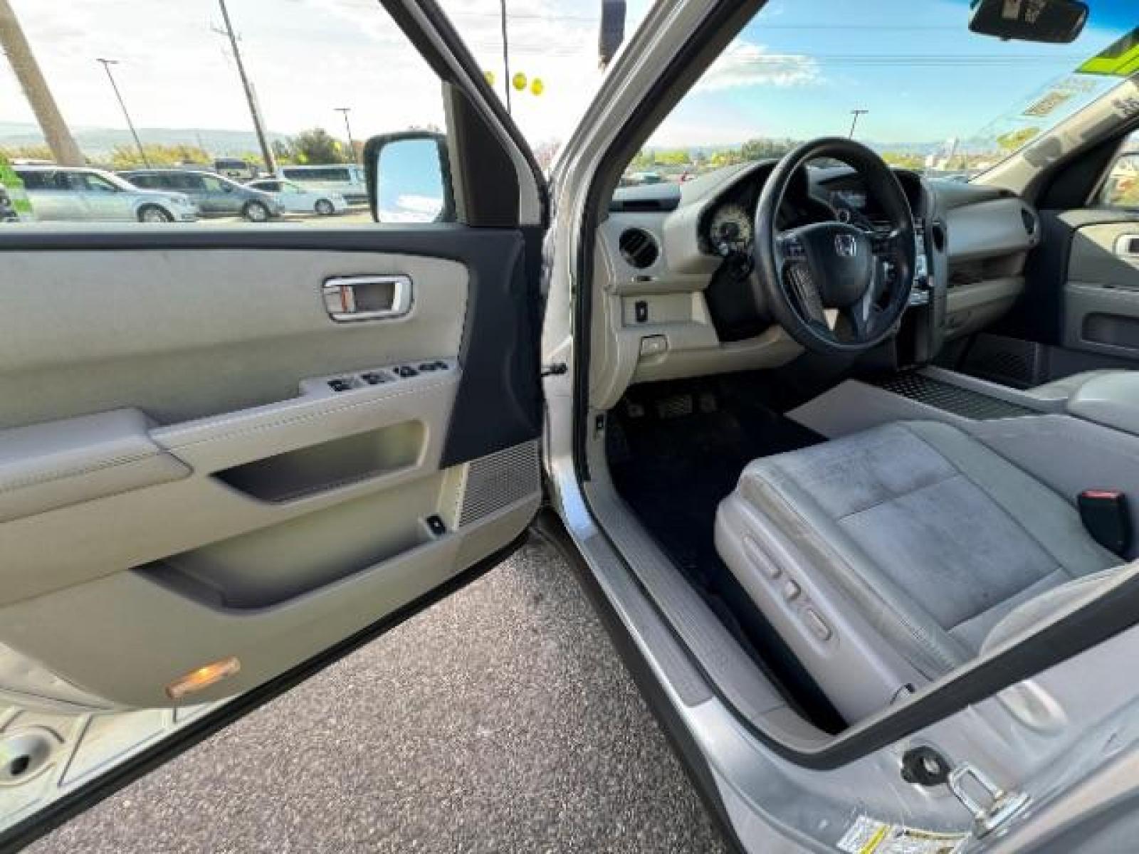 2012 Alabaster Silver Metallic /Gray Cloth Interior Honda Pilot EX 4WD 5-Spd AT (5FNYF4H40CB) with an 3.5L V6 SOHC 24V engine, 5-Speed Automatic transmission, located at 940 North Main Street, Cedar City, UT, 84720, (435) 628-0023, 37.692936, -113.061897 - We specialize in helping ALL people get the best financing available. No matter your credit score, good, bad or none we can get you an amazing rate. Had a bankruptcy, divorce, or repossessions? We give you the green light to get your credit back on the road. Low down and affordable payments that fit - Photo #15