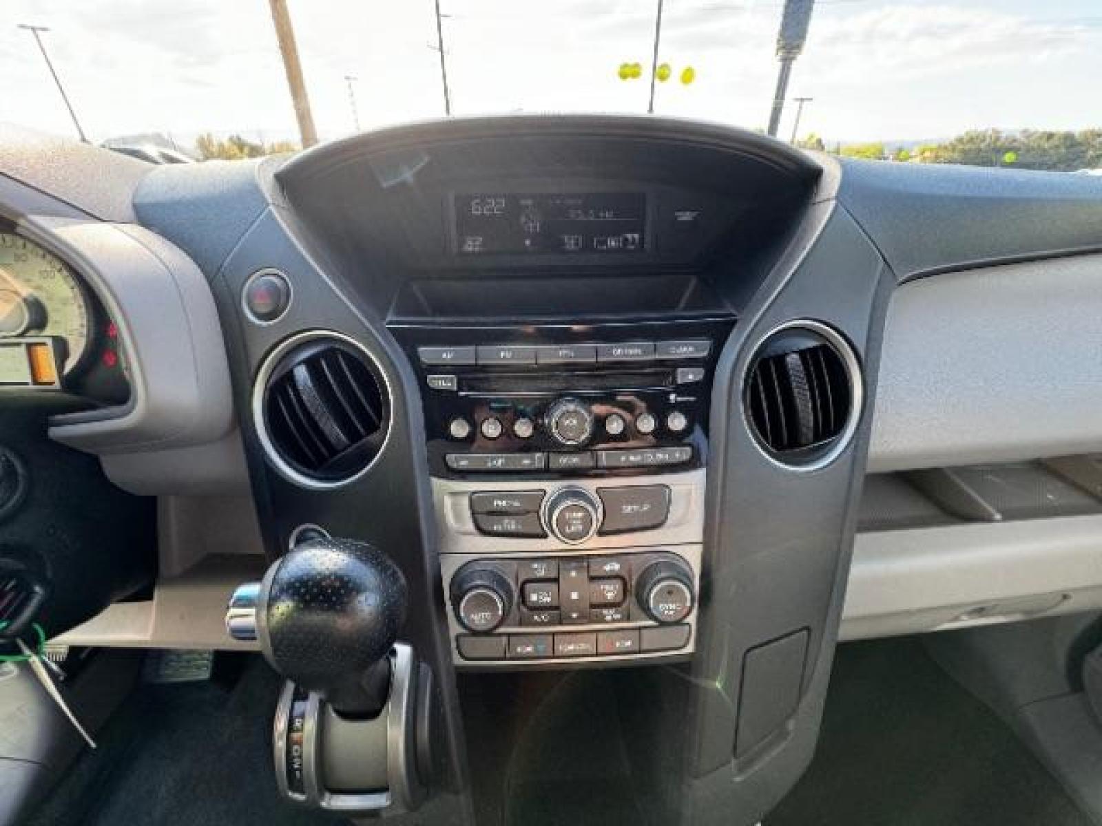 2012 Alabaster Silver Metallic /Gray Cloth Interior Honda Pilot EX 4WD 5-Spd AT (5FNYF4H40CB) with an 3.5L V6 SOHC 24V engine, 5-Speed Automatic transmission, located at 940 North Main Street, Cedar City, UT, 84720, (435) 628-0023, 37.692936, -113.061897 - We specialize in helping ALL people get the best financing available. No matter your credit score, good, bad or none we can get you an amazing rate. Had a bankruptcy, divorce, or repossessions? We give you the green light to get your credit back on the road. Low down and affordable payments that fit - Photo #24