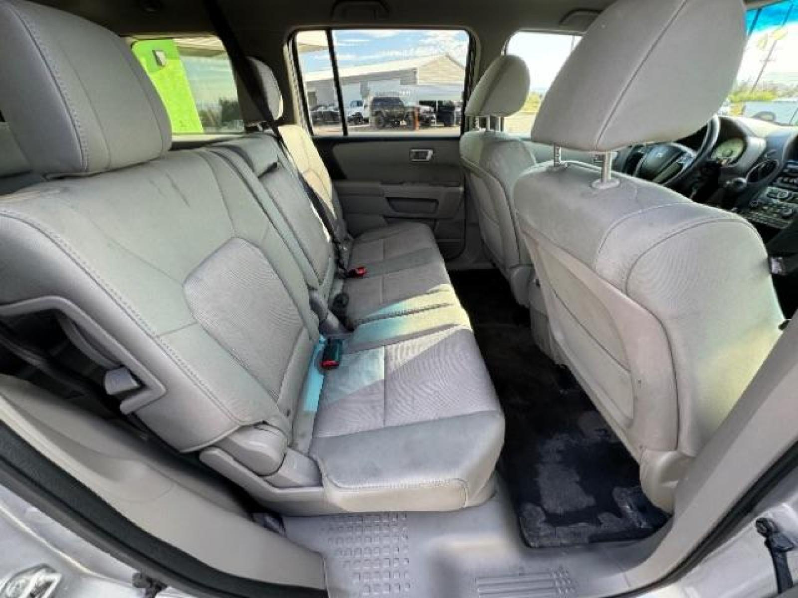 2012 Alabaster Silver Metallic /Gray Cloth Interior Honda Pilot EX 4WD 5-Spd AT (5FNYF4H40CB) with an 3.5L V6 SOHC 24V engine, 5-Speed Automatic transmission, located at 940 North Main Street, Cedar City, UT, 84720, (435) 628-0023, 37.692936, -113.061897 - We specialize in helping ALL people get the best financing available. No matter your credit score, good, bad or none we can get you an amazing rate. Had a bankruptcy, divorce, or repossessions? We give you the green light to get your credit back on the road. Low down and affordable payments that fit - Photo #35