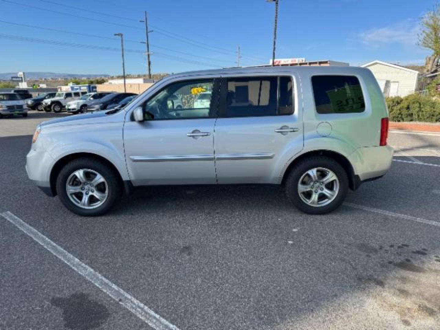 2012 Alabaster Silver Metallic /Gray Cloth Interior Honda Pilot EX 4WD 5-Spd AT (5FNYF4H40CB) with an 3.5L V6 SOHC 24V engine, 5-Speed Automatic transmission, located at 940 North Main Street, Cedar City, UT, 84720, (435) 628-0023, 37.692936, -113.061897 - Photo#4
