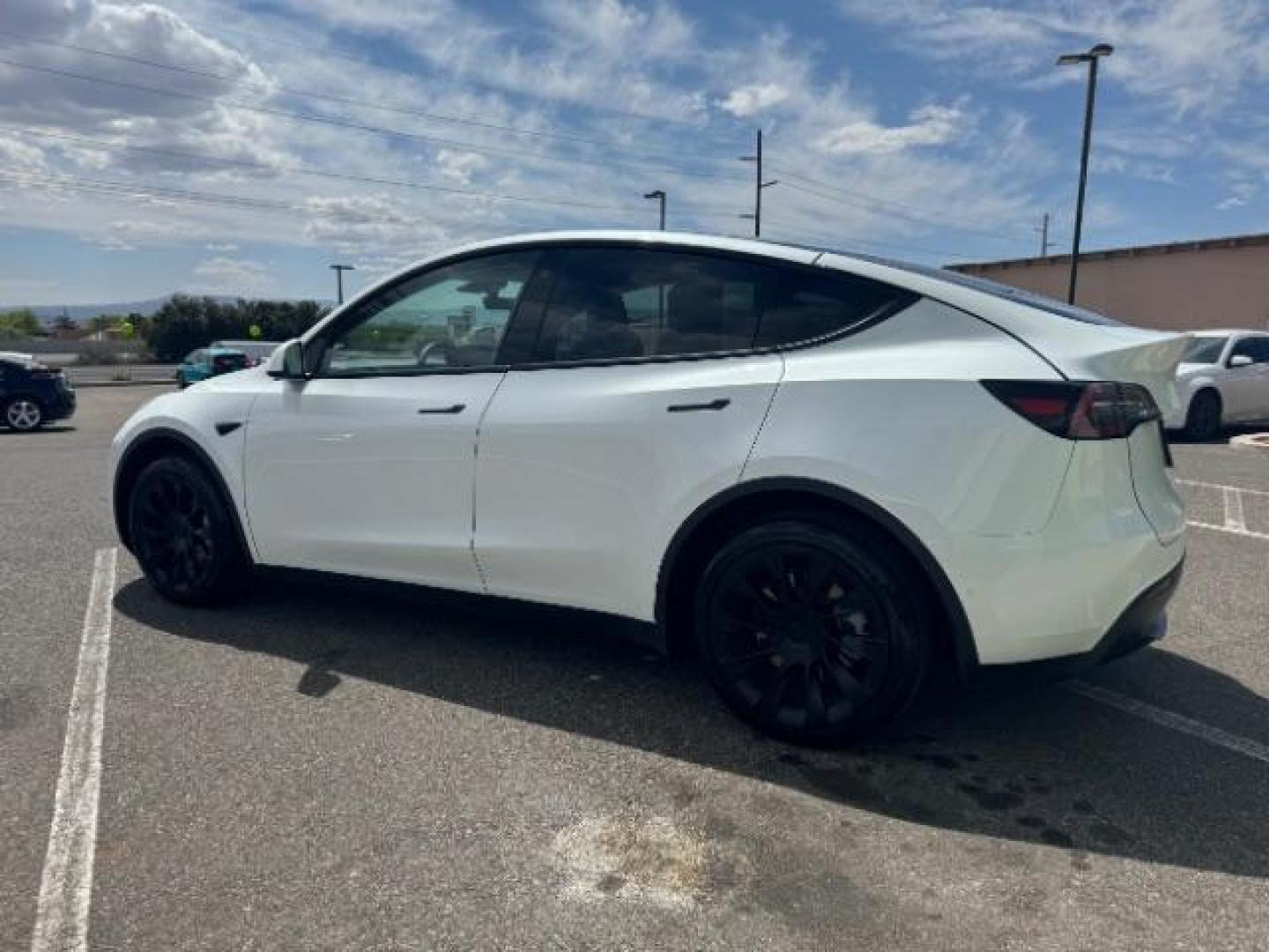 2022 Pearl White Multi-Coat /All Black Tesla Model Y Long Range (7SAYGDEE4NF) with an ELECTRIC engine, 1-Speed Automatic transmission, located at 1865 East Red Hills Pkwy, St. George, 84770, (435) 628-0023, 37.120850, -113.543640 - Photo#5
