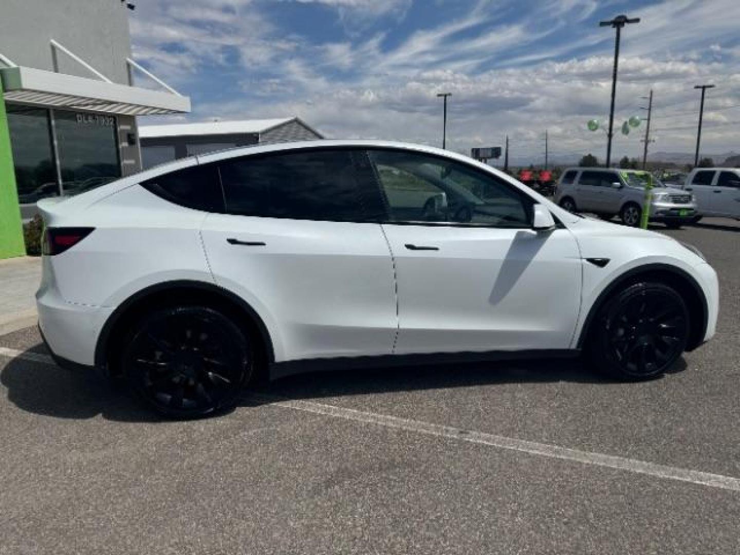2022 Pearl White Multi-Coat /All Black Tesla Model Y Long Range (7SAYGDEE4NF) with an ELECTRIC engine, 1-Speed Automatic transmission, located at 1865 East Red Hills Pkwy, St. George, 84770, (435) 628-0023, 37.120850, -113.543640 - Photo#9