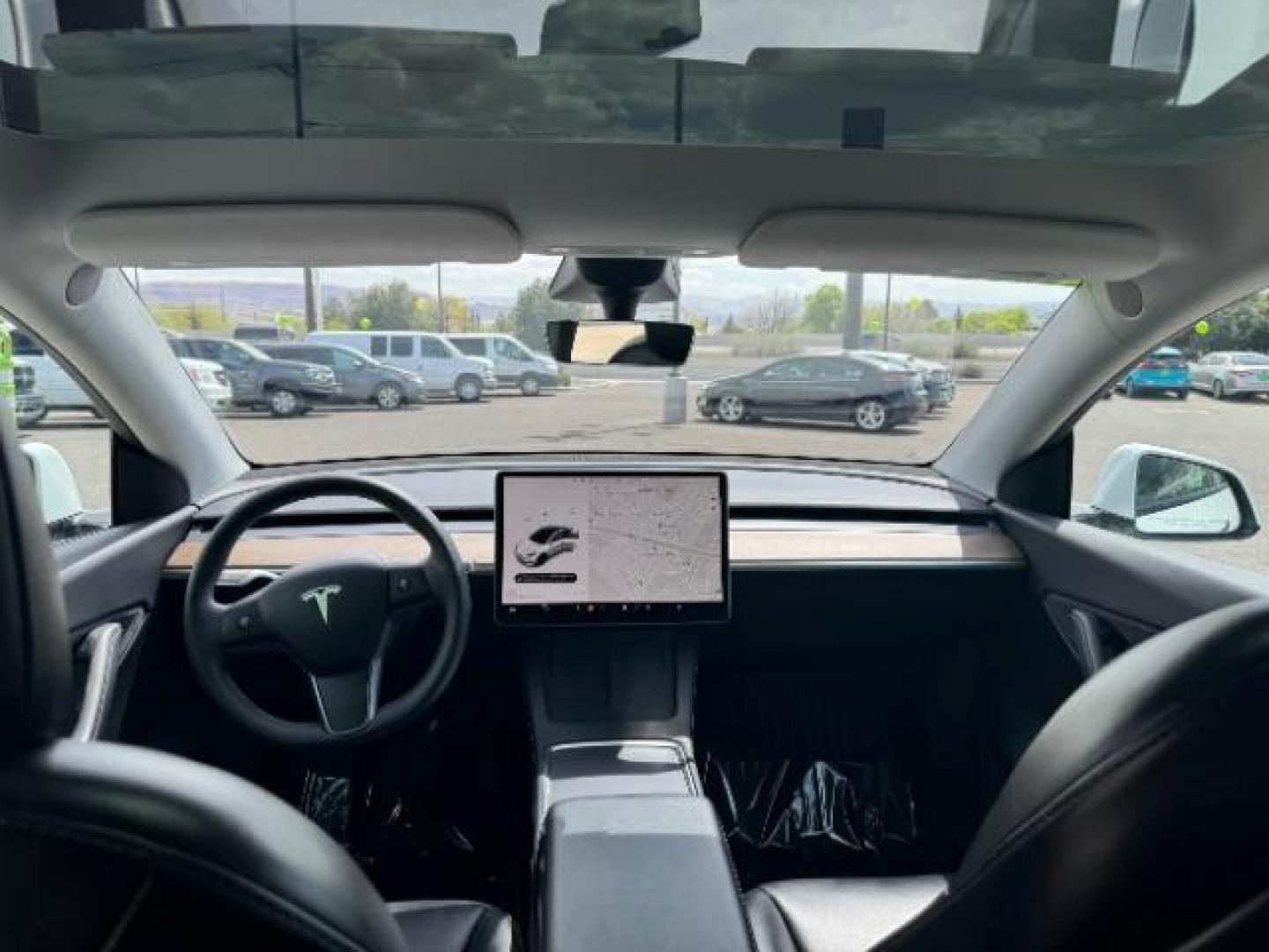 2022 Pearl White Multi-Coat /All Black Tesla Model Y Long Range (7SAYGDEE4NF) with an ELECTRIC engine, 1-Speed Automatic transmission, located at 1865 East Red Hills Pkwy, St. George, 84770, (435) 628-0023, 37.120850, -113.543640 - Photo#26