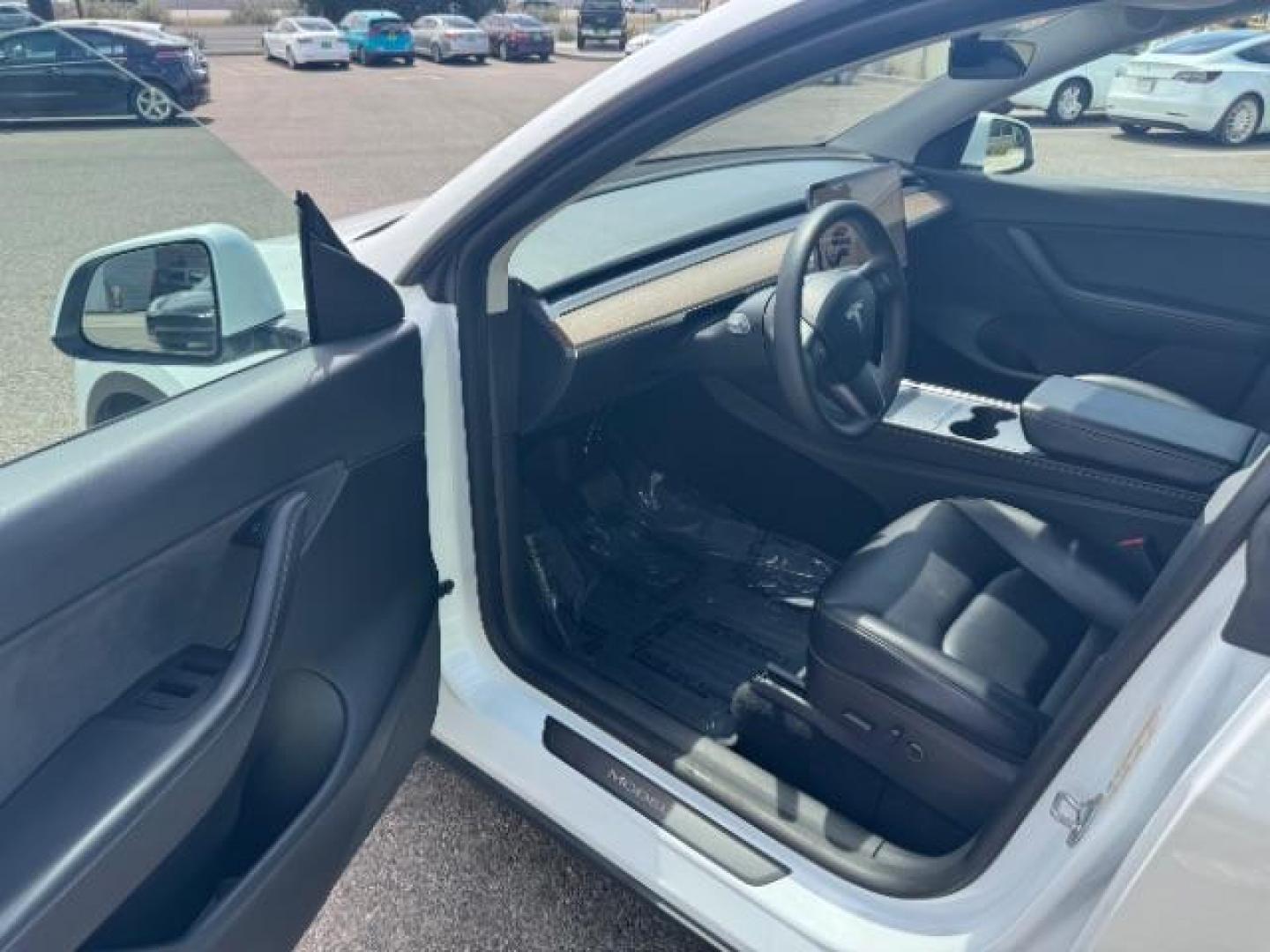 2022 Pearl White Multi-Coat /All Black Tesla Model Y Long Range (7SAYGDEE4NF) with an ELECTRIC engine, 1-Speed Automatic transmission, located at 1865 East Red Hills Pkwy, St. George, 84770, (435) 628-0023, 37.120850, -113.543640 - Photo#16