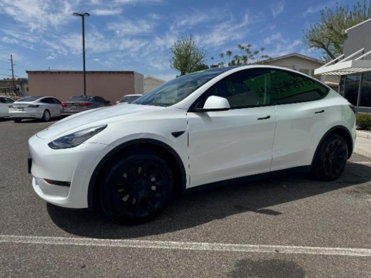 2022 Pearl White Multi-Coat /All Black Tesla Model Y Long Range (7SAYGDEE4NF) with an ELECTRIC engine, 1-Speed Automatic transmission, located at 1865 East Red Hills Pkwy, St. George, 84770, (435) 628-0023, 37.120850, -113.543640 - Photo#3