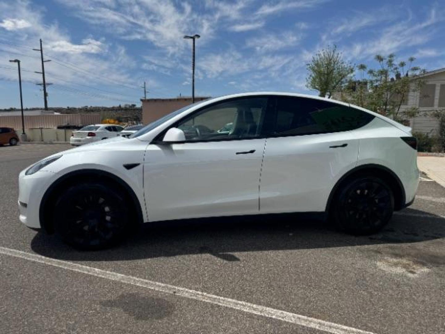 2022 Pearl White Multi-Coat /All Black Tesla Model Y Long Range (7SAYGDEE4NF) with an ELECTRIC engine, 1-Speed Automatic transmission, located at 1865 East Red Hills Pkwy, St. George, 84770, (435) 628-0023, 37.120850, -113.543640 - Photo#4
