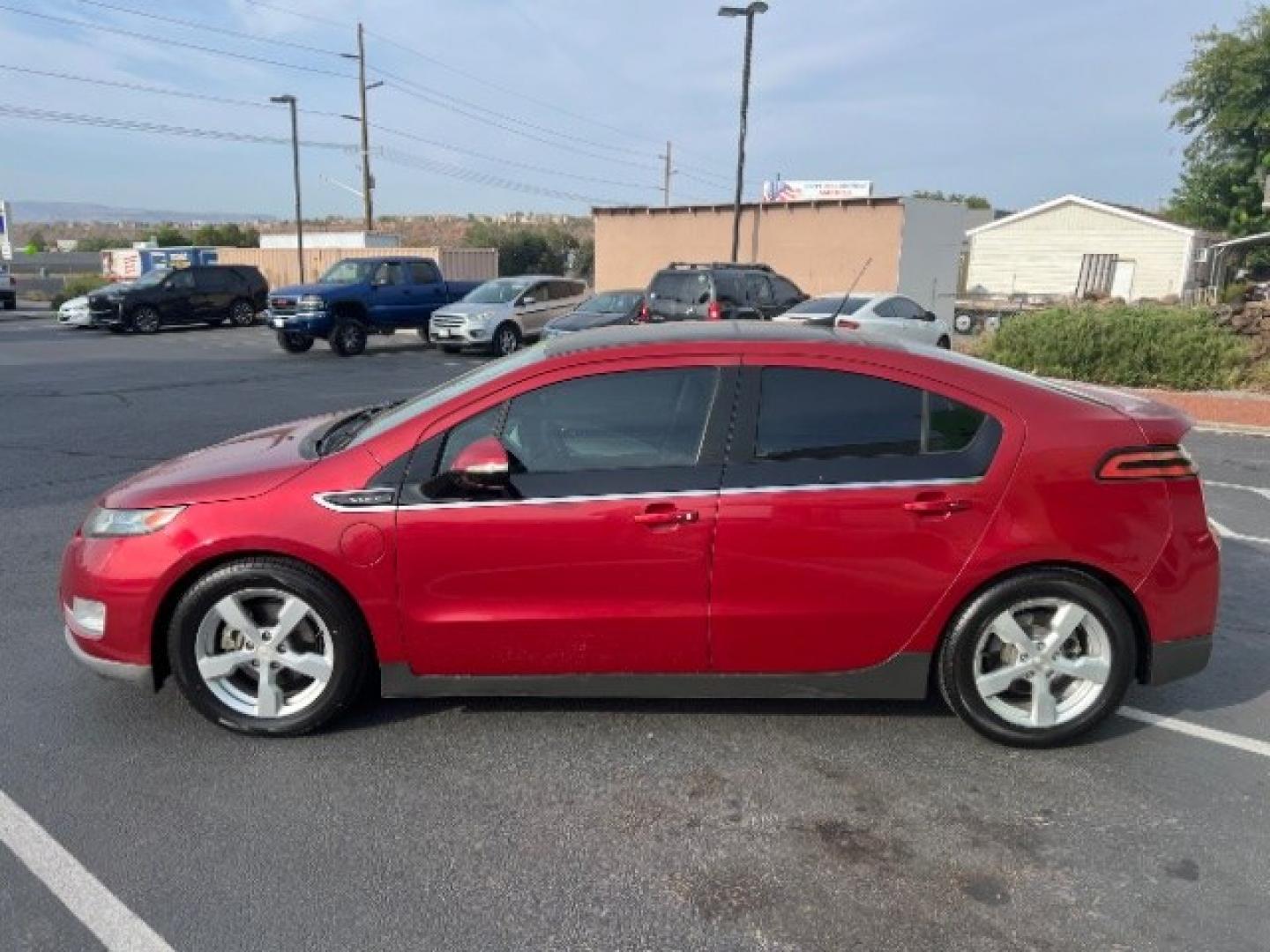2012 Crystal Red Tintcoat /Jet Black and Ceramic White Leather Interior Chevrolet Volt Standard (1G1RA6E45CU) with an 1.4L L4 DOHC 16V PLUG-IN HYBRID engine, Continuously Variable Transmission transmission, located at 1865 East Red Hills Pkwy, St. George, 84770, (435) 628-0023, 37.120850, -113.543640 - We specialize in helping ALL people get the best financing available. No matter your credit score, good, bad or none we can get you an amazing rate. Had a bankruptcy, divorce, or repossessions? We give you the green light to get your credit back on the road. Low down and affordable payments that fit- Photo#3