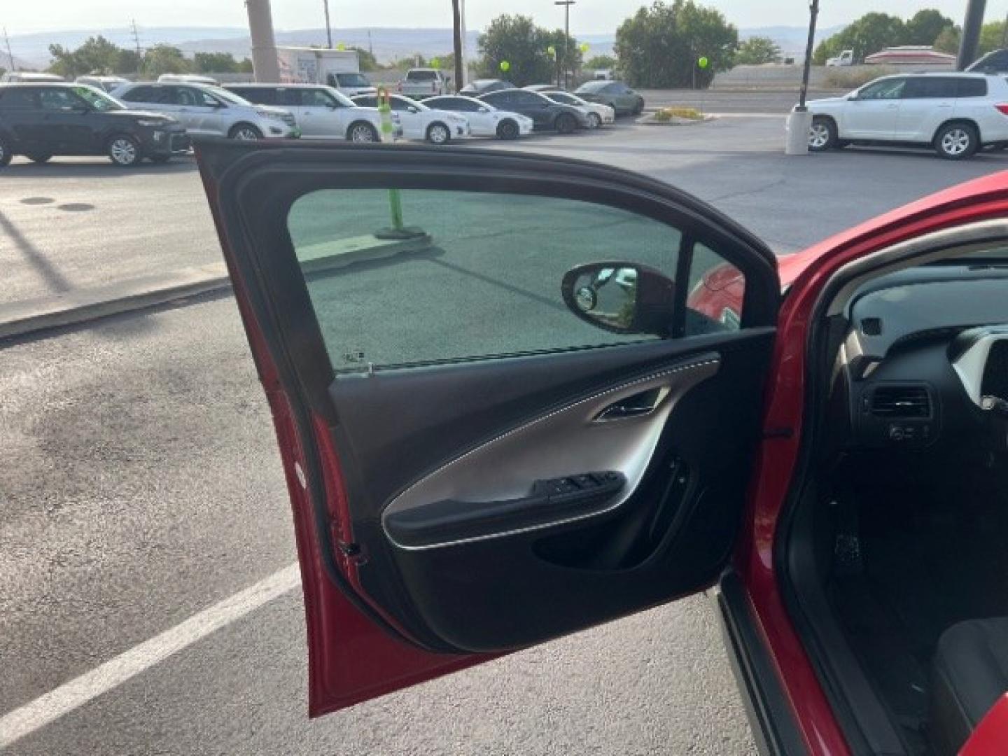 2012 Crystal Red Tintcoat /Jet Black and Ceramic White Leather Interior Chevrolet Volt Standard (1G1RA6E45CU) with an 1.4L L4 DOHC 16V PLUG-IN HYBRID engine, Continuously Variable Transmission transmission, located at 1865 East Red Hills Pkwy, St. George, 84770, (435) 628-0023, 37.120850, -113.543640 - We specialize in helping ALL people get the best financing available. No matter your credit score, good, bad or none we can get you an amazing rate. Had a bankruptcy, divorce, or repossessions? We give you the green light to get your credit back on the road. Low down and affordable payments that fit- Photo#12