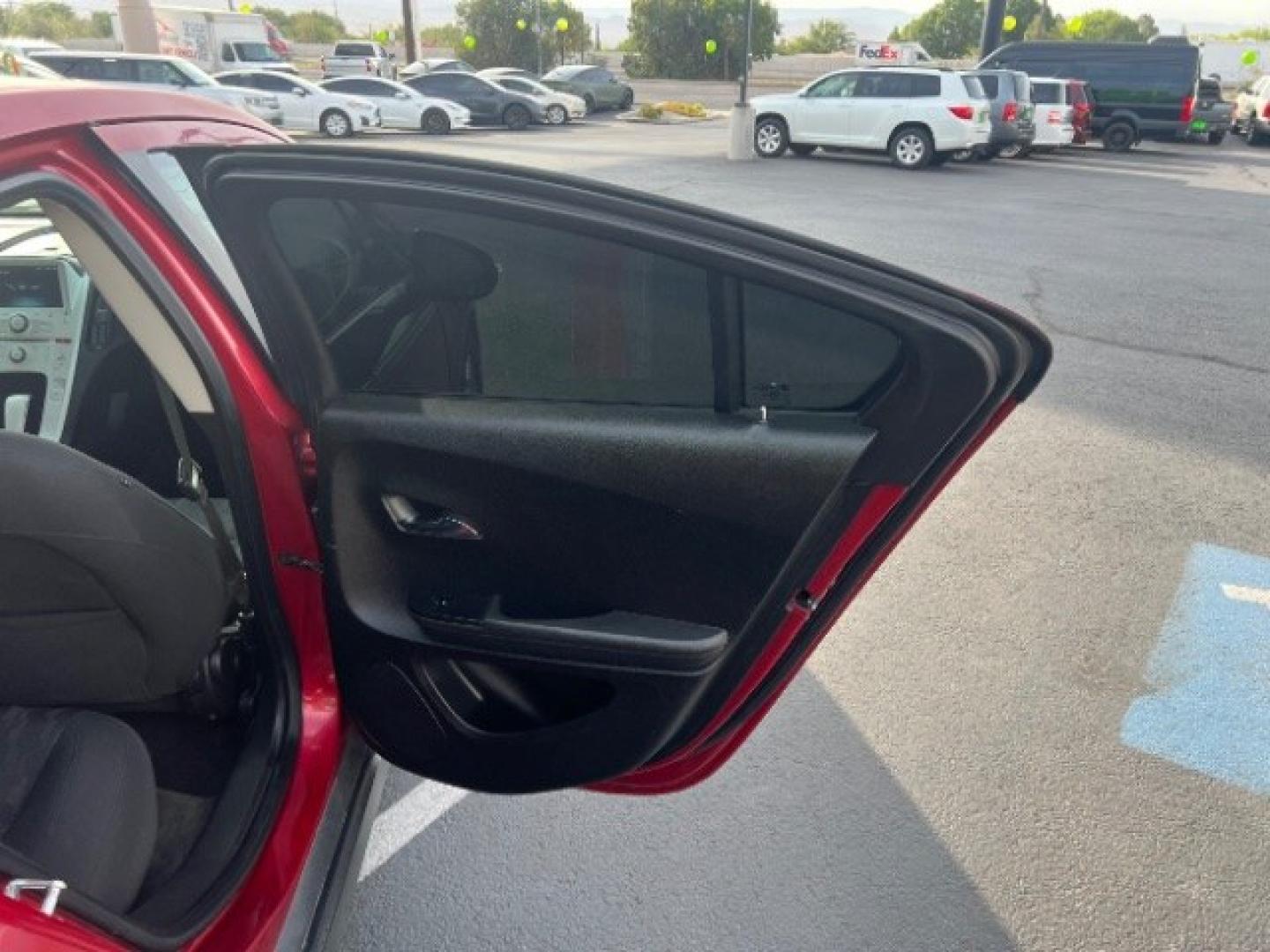 2012 Crystal Red Tintcoat /Jet Black and Ceramic White Leather Interior Chevrolet Volt Standard (1G1RA6E45CU) with an 1.4L L4 DOHC 16V PLUG-IN HYBRID engine, Continuously Variable Transmission transmission, located at 1865 East Red Hills Pkwy, St. George, 84770, (435) 628-0023, 37.120850, -113.543640 - We specialize in helping ALL people get the best financing available. No matter your credit score, good, bad or none we can get you an amazing rate. Had a bankruptcy, divorce, or repossessions? We give you the green light to get your credit back on the road. Low down and affordable payments that fit- Photo#25