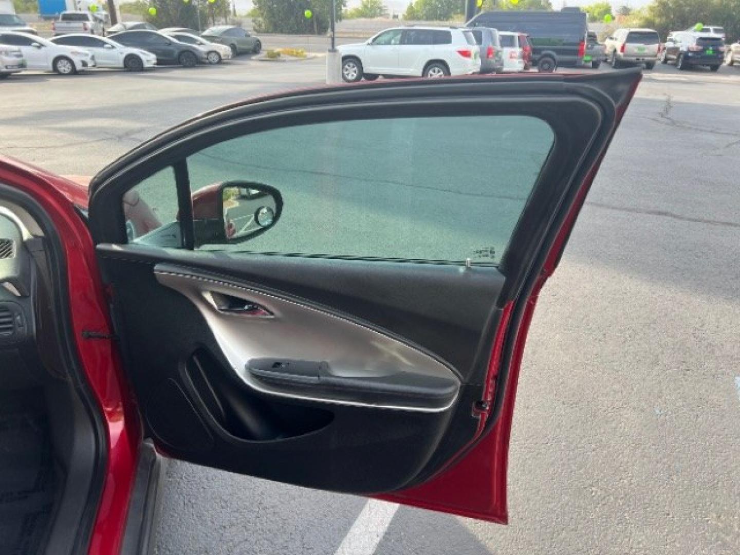 2012 Crystal Red Tintcoat /Jet Black and Ceramic White Leather Interior Chevrolet Volt Standard (1G1RA6E45CU) with an 1.4L L4 DOHC 16V PLUG-IN HYBRID engine, Continuously Variable Transmission transmission, located at 1865 East Red Hills Pkwy, St. George, 84770, (435) 628-0023, 37.120850, -113.543640 - We specialize in helping ALL people get the best financing available. No matter your credit score, good, bad or none we can get you an amazing rate. Had a bankruptcy, divorce, or repossessions? We give you the green light to get your credit back on the road. Low down and affordable payments that fit- Photo#27