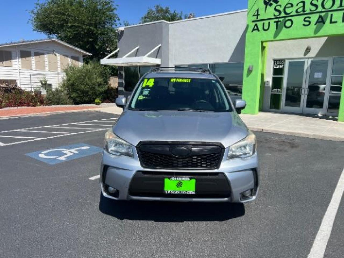 2014 Ice Silver Metallic /Black Subaru Forester 2.0XT Touring (JF2SJGMC7EH) with an 2.0L H4 SOHC 16V engine, Continuously Variabl transmission, located at 940 North Main Street, Cedar City, UT, 84720, (435) 628-0023, 37.692936, -113.061897 - We specialize in helping ALL people get the best financing available. No matter your credit score, good, bad or none we can get you an amazing rate. Had a bankruptcy, divorce, or repossessions? We give you the green light to get your credit back on the road. Low down and affordable payments that fit - Photo#1
