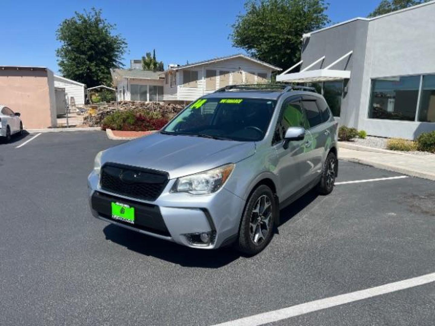 2014 Ice Silver Metallic /Black Subaru Forester 2.0XT Touring (JF2SJGMC7EH) with an 2.0L H4 SOHC 16V engine, Continuously Variabl transmission, located at 940 North Main Street, Cedar City, UT, 84720, (435) 628-0023, 37.692936, -113.061897 - We specialize in helping ALL people get the best financing available. No matter your credit score, good, bad or none we can get you an amazing rate. Had a bankruptcy, divorce, or repossessions? We give you the green light to get your credit back on the road. Low down and affordable payments that fit - Photo#2