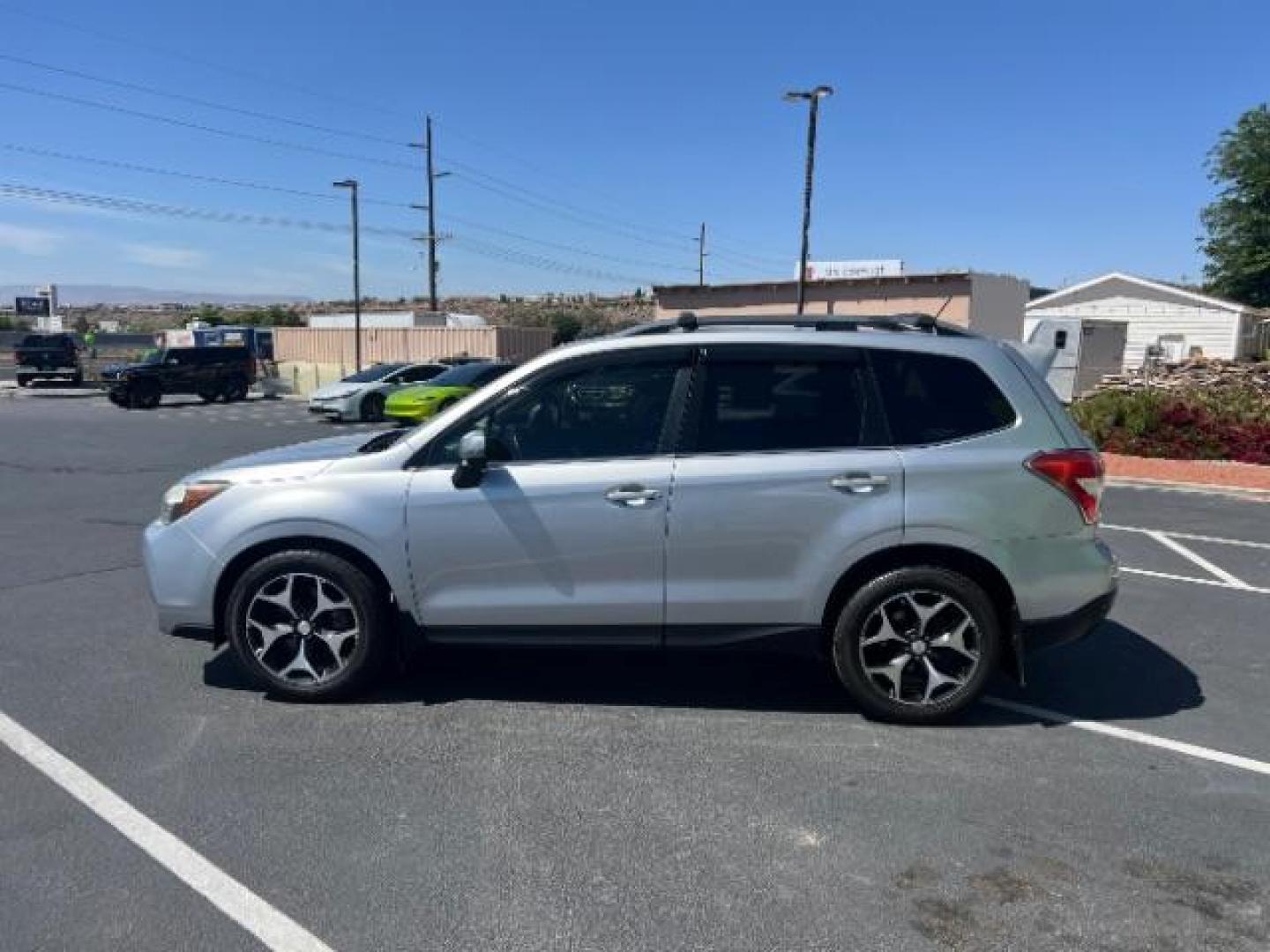 2014 Ice Silver Metallic /Black Subaru Forester 2.0XT Touring (JF2SJGMC7EH) with an 2.0L H4 SOHC 16V engine, Continuously Variabl transmission, located at 940 North Main Street, Cedar City, UT, 84720, (435) 628-0023, 37.692936, -113.061897 - We specialize in helping ALL people get the best financing available. No matter your credit score, good, bad or none we can get you an amazing rate. Had a bankruptcy, divorce, or repossessions? We give you the green light to get your credit back on the road. Low down and affordable payments that fit - Photo#3