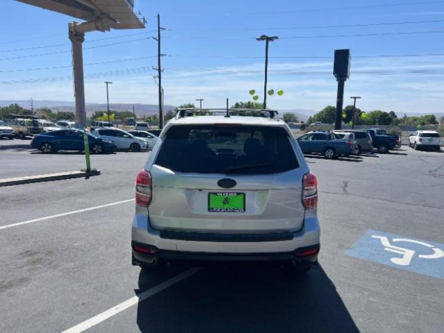 2014 Ice Silver Metallic /Black Subaru Forester 2.0XT Touring (JF2SJGMC7EH) with an 2.0L H4 SOHC 16V engine, Continuously Variabl transmission, located at 940 North Main Street, Cedar City, UT, 84720, (435) 628-0023, 37.692936, -113.061897 - We specialize in helping ALL people get the best financing available. No matter your credit score, good, bad or none we can get you an amazing rate. Had a bankruptcy, divorce, or repossessions? We give you the green light to get your credit back on the road. Low down and affordable payments that fit - Photo#5