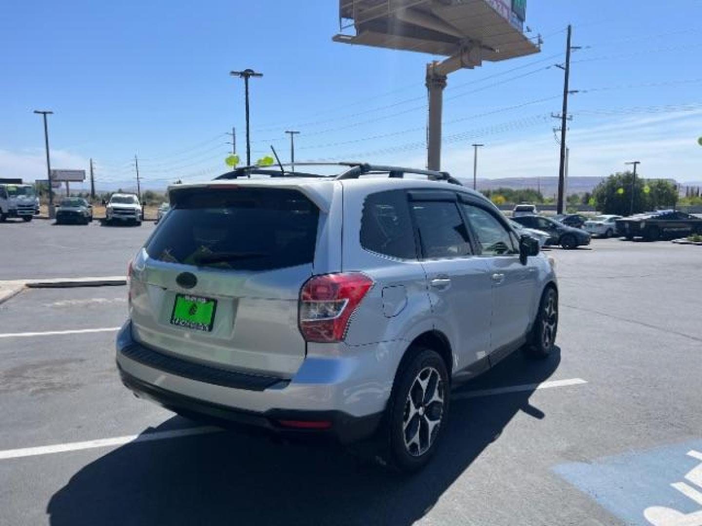 2014 Ice Silver Metallic /Black Subaru Forester 2.0XT Touring (JF2SJGMC7EH) with an 2.0L H4 SOHC 16V engine, Continuously Variabl transmission, located at 940 North Main Street, Cedar City, UT, 84720, (435) 628-0023, 37.692936, -113.061897 - We specialize in helping ALL people get the best financing available. No matter your credit score, good, bad or none we can get you an amazing rate. Had a bankruptcy, divorce, or repossessions? We give you the green light to get your credit back on the road. Low down and affordable payments that fit - Photo#6