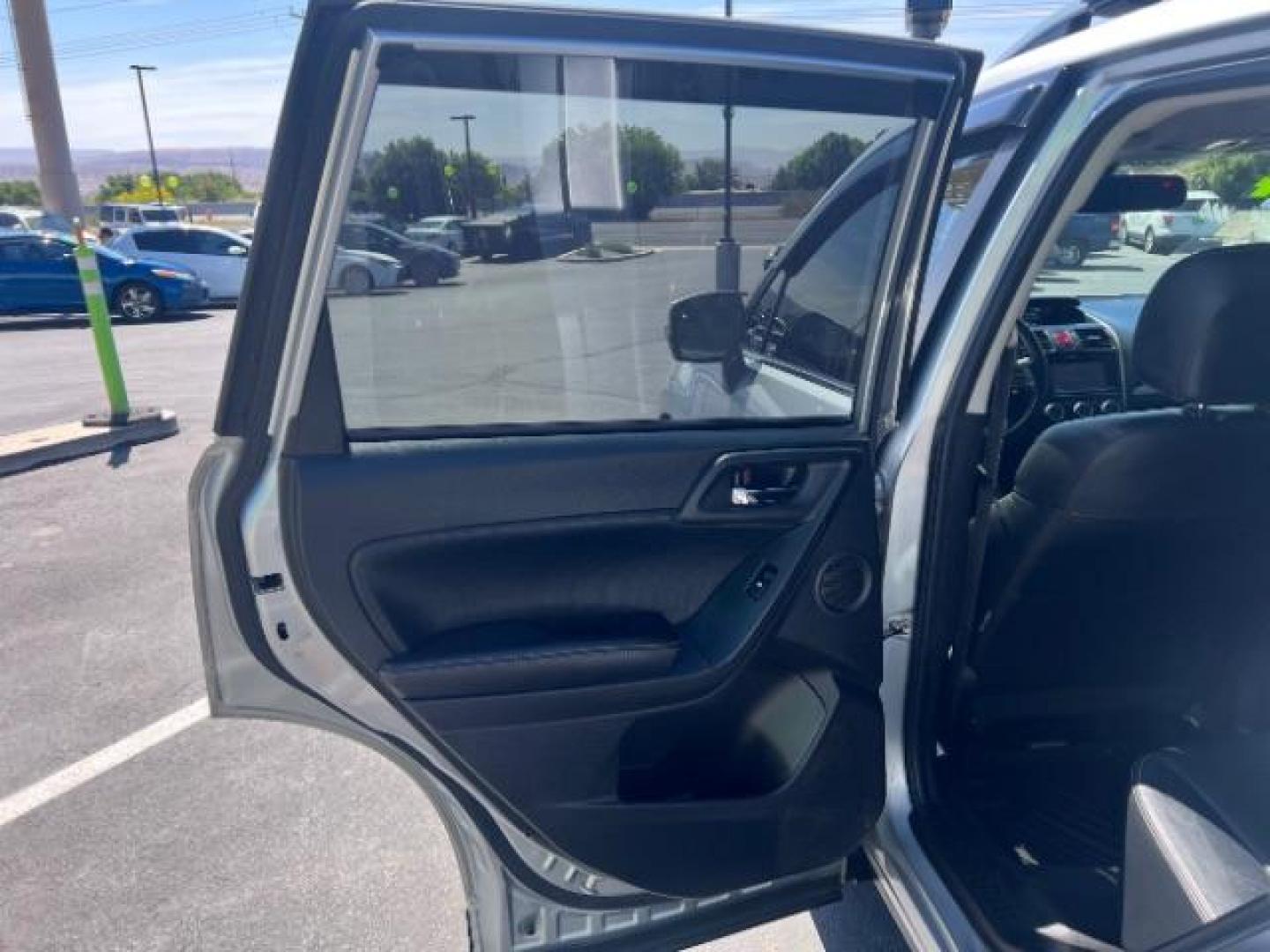 2014 Ice Silver Metallic /Black Subaru Forester 2.0XT Touring (JF2SJGMC7EH) with an 2.0L H4 SOHC 16V engine, Continuously Variabl transmission, located at 940 North Main Street, Cedar City, UT, 84720, (435) 628-0023, 37.692936, -113.061897 - We specialize in helping ALL people get the best financing available. No matter your credit score, good, bad or none we can get you an amazing rate. Had a bankruptcy, divorce, or repossessions? We give you the green light to get your credit back on the road. Low down and affordable payments that fit - Photo#21