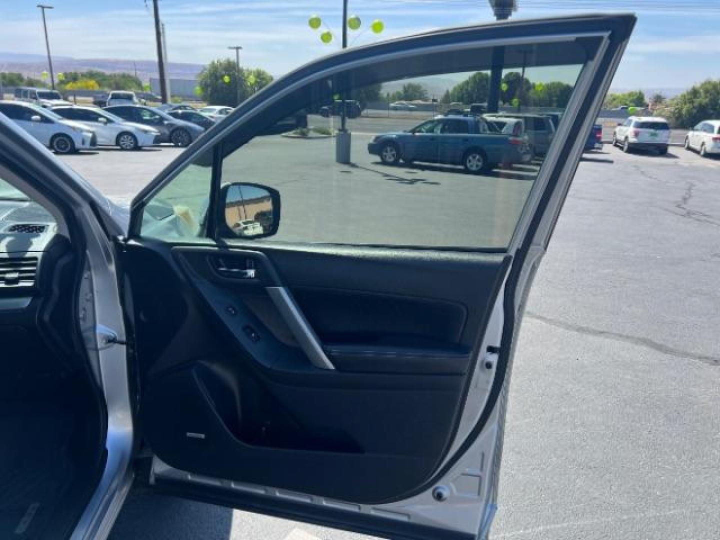 2014 Ice Silver Metallic /Black Subaru Forester 2.0XT Touring (JF2SJGMC7EH) with an 2.0L H4 SOHC 16V engine, Continuously Variabl transmission, located at 940 North Main Street, Cedar City, UT, 84720, (435) 628-0023, 37.692936, -113.061897 - We specialize in helping ALL people get the best financing available. No matter your credit score, good, bad or none we can get you an amazing rate. Had a bankruptcy, divorce, or repossessions? We give you the green light to get your credit back on the road. Low down and affordable payments that fit - Photo#28