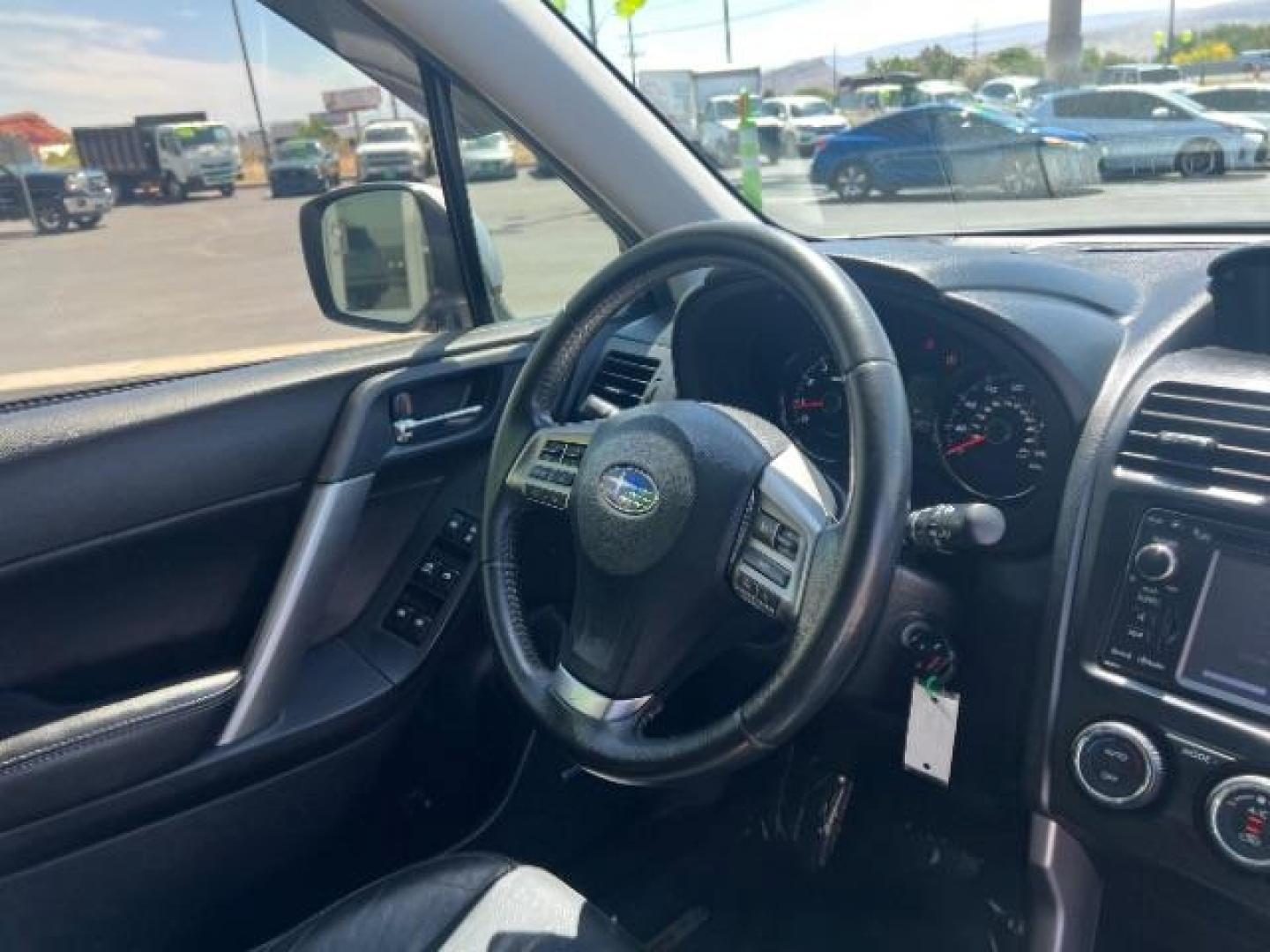 2014 Ice Silver Metallic /Black Subaru Forester 2.0XT Touring (JF2SJGMC7EH) with an 2.0L H4 SOHC 16V engine, Continuously Variabl transmission, located at 940 North Main Street, Cedar City, UT, 84720, (435) 628-0023, 37.692936, -113.061897 - We specialize in helping ALL people get the best financing available. No matter your credit score, good, bad or none we can get you an amazing rate. Had a bankruptcy, divorce, or repossessions? We give you the green light to get your credit back on the road. Low down and affordable payments that fit - Photo#31