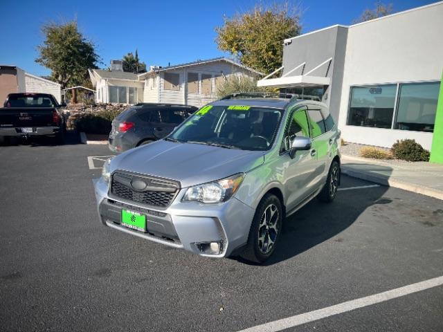 2014 Ice Silver Metallic /Black Subaru Forester 2.0XT Touring (JF2SJGMC7EH) with an 2.0L H4 SOHC 16V engine, Continuously Variable Transmission transmission, located at 940 North Main Street, Cedar City, UT, 84720, (435) 628-0023, 37.692936, -113.061897 - We specialize in helping ALL people get the best financing available. No matter your credit score, good, bad or none we can get you an amazing rate. Had a bankruptcy, divorce, or repossessions? We give you the green light to get your credit back on the road. Low down and affordable payments that fit - Photo#2