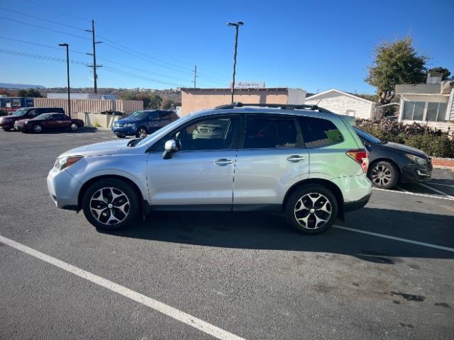 2014 Ice Silver Metallic /Black Subaru Forester 2.0XT Touring (JF2SJGMC7EH) with an 2.0L H4 SOHC 16V engine, Continuously Variable Transmission transmission, located at 940 North Main Street, Cedar City, UT, 84720, (435) 628-0023, 37.692936, -113.061897 - We specialize in helping ALL people get the best financing available. No matter your credit score, good, bad or none we can get you an amazing rate. Had a bankruptcy, divorce, or repossessions? We give you the green light to get your credit back on the road. Low down and affordable payments that fit - Photo#3