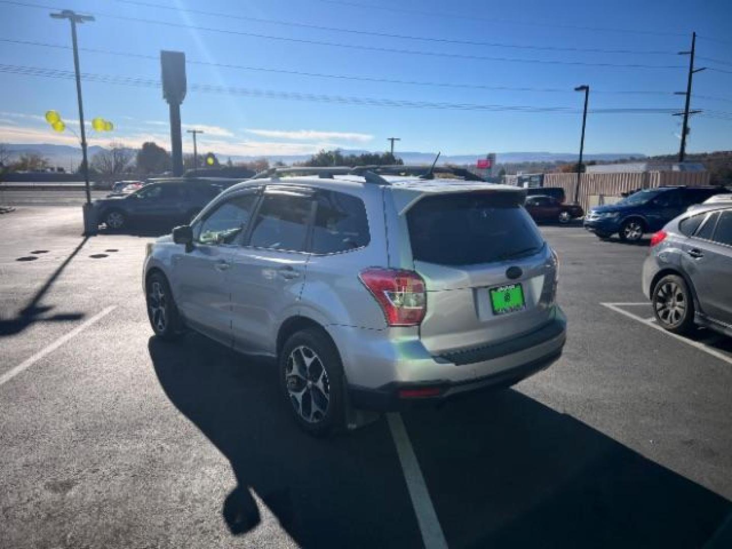 2014 Ice Silver Metallic /Black Subaru Forester 2.0XT Touring (JF2SJGMC7EH) with an 2.0L H4 SOHC 16V engine, Continuously Variable Transmission transmission, located at 940 North Main Street, Cedar City, UT, 84720, (435) 628-0023, 37.692936, -113.061897 - We specialize in helping ALL people get the best financing available. No matter your credit score, good, bad or none we can get you an amazing rate. Had a bankruptcy, divorce, or repossessions? We give you the green light to get your credit back on the road. Low down and affordable payments that fit - Photo#4