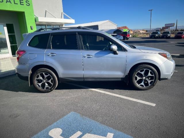 2014 Ice Silver Metallic /Black Subaru Forester 2.0XT Touring (JF2SJGMC7EH) with an 2.0L H4 SOHC 16V engine, Continuously Variable Transmission transmission, located at 940 North Main Street, Cedar City, UT, 84720, (435) 628-0023, 37.692936, -113.061897 - We specialize in helping ALL people get the best financing available. No matter your credit score, good, bad or none we can get you an amazing rate. Had a bankruptcy, divorce, or repossessions? We give you the green light to get your credit back on the road. Low down and affordable payments that fit - Photo#7