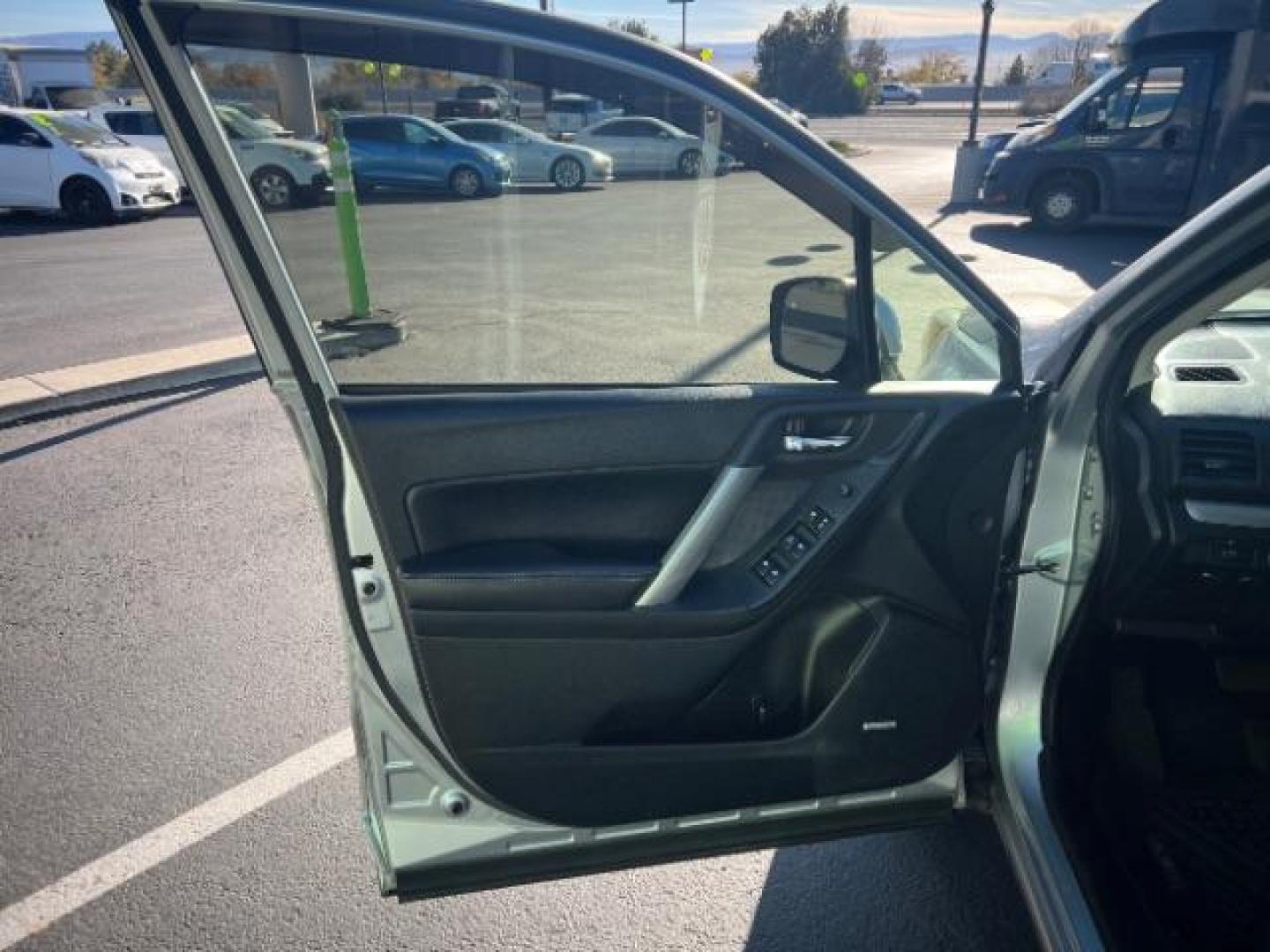 2014 Ice Silver Metallic /Black Subaru Forester 2.0XT Touring (JF2SJGMC7EH) with an 2.0L H4 SOHC 16V engine, Continuously Variable Transmission transmission, located at 940 North Main Street, Cedar City, UT, 84720, (435) 628-0023, 37.692936, -113.061897 - We specialize in helping ALL people get the best financing available. No matter your credit score, good, bad or none we can get you an amazing rate. Had a bankruptcy, divorce, or repossessions? We give you the green light to get your credit back on the road. Low down and affordable payments that fit - Photo#12