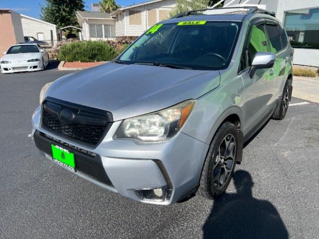 2014 Ice Silver Metallic /Black Subaru Forester 2.0XT Touring (JF2SJGMC7EH) with an 2.0L H4 SOHC 16V engine, Continuously Variable Transmission transmission, located at 940 North Main Street, Cedar City, UT, 84720, (435) 628-0023, 37.692936, -113.061897 - Versatile Southern Utah travel starts with this 2014 Subaru Forester 2.0XT Touring. Its turbocharged 2.0L 4-cylinder, CVT automatic, and Symmetrical All-Wheel Drive make it a smart fit for commuting, mountain roads, and weekend exploring. With 176,940 miles, this Forester is ready for its next adven- Photo#2