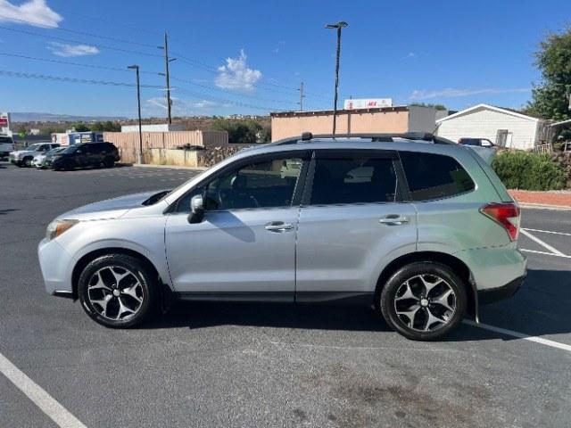 2014 Ice Silver Metallic /Black Subaru Forester 2.0XT Touring (JF2SJGMC7EH) with an 2.0L H4 SOHC 16V engine, Continuously Variable Transmission transmission, located at 940 North Main Street, Cedar City, UT, 84720, (435) 628-0023, 37.692936, -113.061897 - Versatile Southern Utah travel starts with this 2014 Subaru Forester 2.0XT Touring. Its turbocharged 2.0L 4-cylinder, CVT automatic, and Symmetrical All-Wheel Drive make it a smart fit for commuting, mountain roads, and weekend exploring. With 176,940 miles, this Forester is ready for its next adven- Photo#3