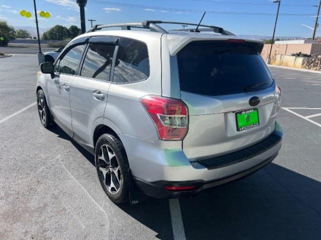 2014 Ice Silver Metallic /Black Subaru Forester 2.0XT Touring (JF2SJGMC7EH) with an 2.0L H4 SOHC 16V engine, Continuously Variable Transmission transmission, located at 940 North Main Street, Cedar City, UT, 84720, (435) 628-0023, 37.692936, -113.061897 - Versatile Southern Utah travel starts with this 2014 Subaru Forester 2.0XT Touring. Its turbocharged 2.0L 4-cylinder, CVT automatic, and Symmetrical All-Wheel Drive make it a smart fit for commuting, mountain roads, and weekend exploring. With 176,940 miles, this Forester is ready for its next adven- Photo#4