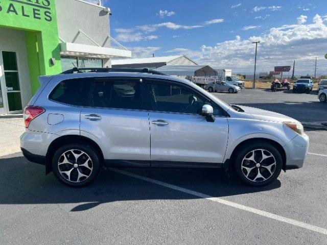 2014 Ice Silver Metallic /Black Subaru Forester 2.0XT Touring (JF2SJGMC7EH) with an 2.0L H4 SOHC 16V engine, Continuously Variable Transmission transmission, located at 940 North Main Street, Cedar City, UT, 84720, (435) 628-0023, 37.692936, -113.061897 - Versatile Southern Utah travel starts with this 2014 Subaru Forester 2.0XT Touring. Its turbocharged 2.0L 4-cylinder, CVT automatic, and Symmetrical All-Wheel Drive make it a smart fit for commuting, mountain roads, and weekend exploring. With 176,940 miles, this Forester is ready for its next adven- Photo#7