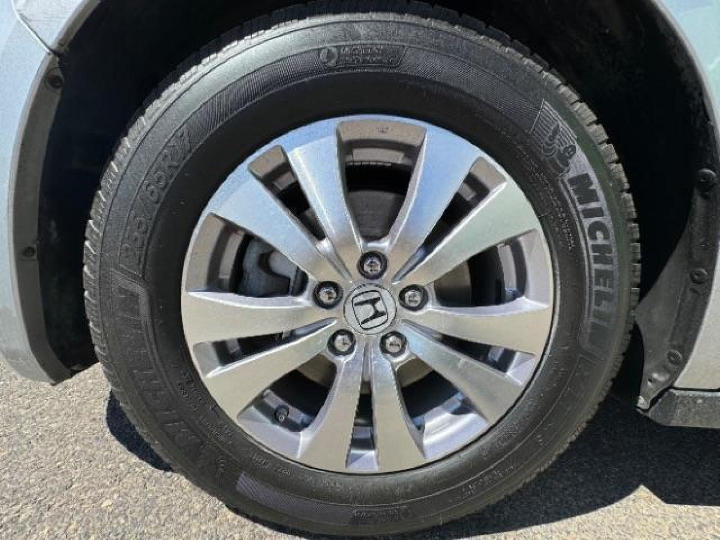 2014 Alabaster Silver Metallic /Beige Honda Odyssey EX-L (5FNRL5H62EB) with an 3.5L V6 SOHC 24V engine, 6-Speed Automatic transmission, located at 1865 East Red Hills Pkwy, St. George, 84770, (435) 628-0023, 37.120850, -113.543640 - We specialize in helping ALL people get the best financing available. No matter your credit score, good, bad or none we can get you an amazing rate. Had a bankruptcy, divorce, or repossessions? We give you the green light to get your credit back on the road. Low down and affordable payments that fit - Photo#11