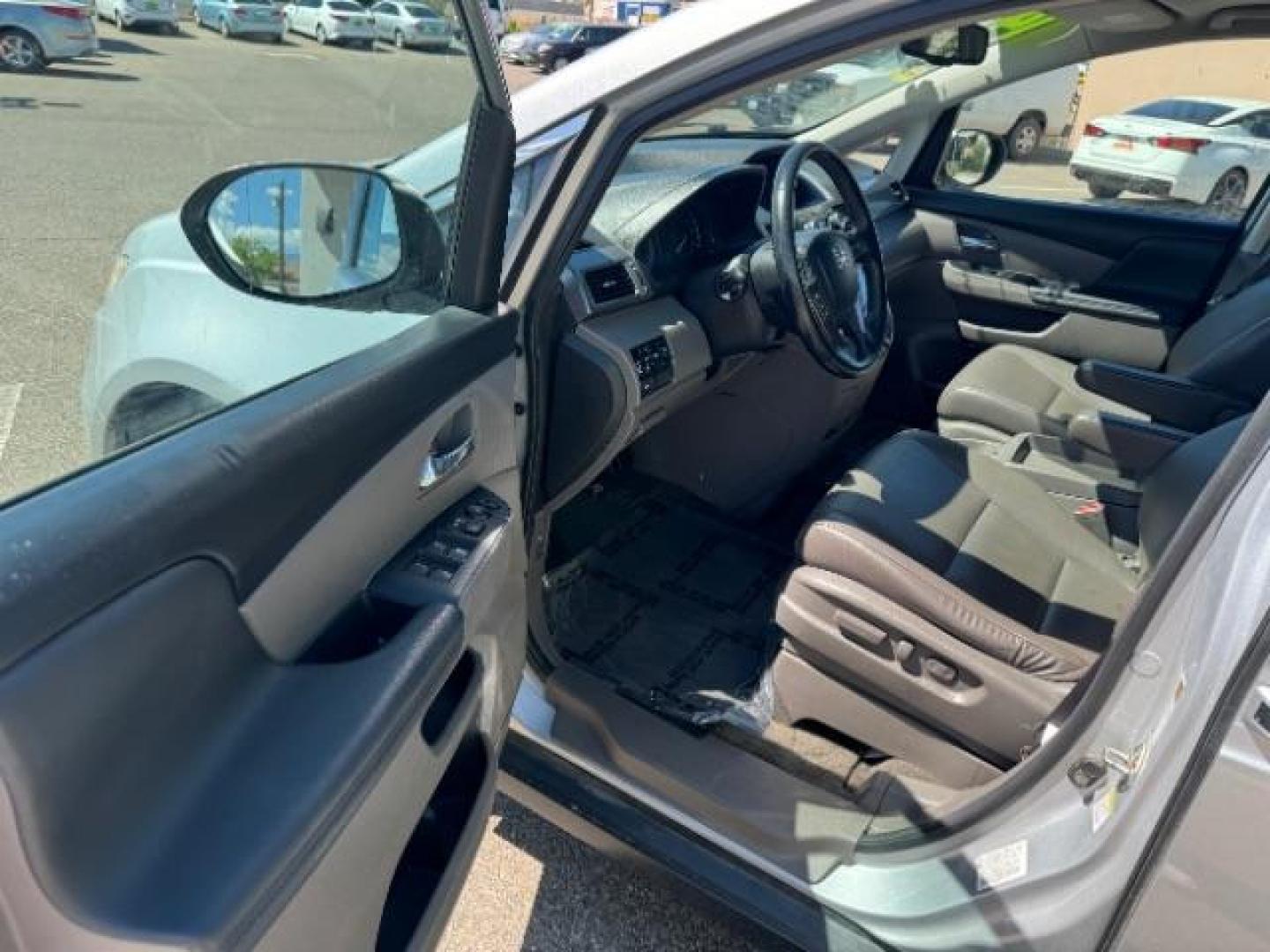 2014 Alabaster Silver Metallic /Beige Honda Odyssey EX-L (5FNRL5H62EB) with an 3.5L V6 SOHC 24V engine, 6-Speed Automatic transmission, located at 1865 East Red Hills Pkwy, St. George, 84770, (435) 628-0023, 37.120850, -113.543640 - We specialize in helping ALL people get the best financing available. No matter your credit score, good, bad or none we can get you an amazing rate. Had a bankruptcy, divorce, or repossessions? We give you the green light to get your credit back on the road. Low down and affordable payments that fit - Photo#12