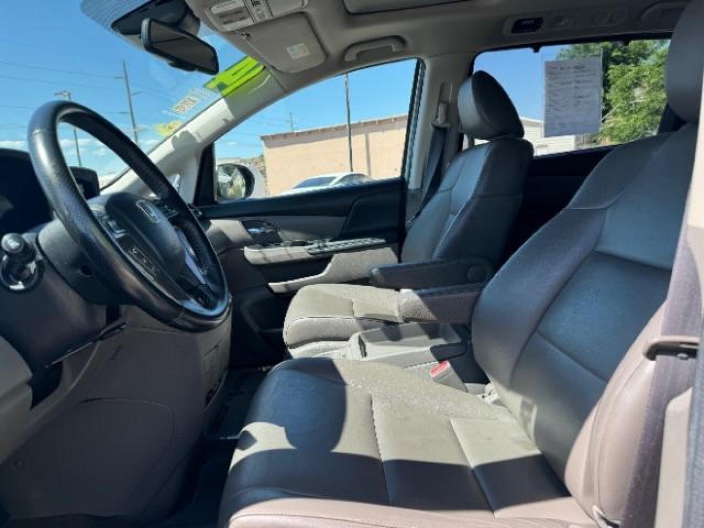 2014 Alabaster Silver Metallic /Beige Honda Odyssey EX-L (5FNRL5H62EB) with an 3.5L V6 SOHC 24V engine, 6-Speed Automatic transmission, located at 1865 East Red Hills Pkwy, St. George, 84770, (435) 628-0023, 37.120850, -113.543640 - We specialize in helping ALL people get the best financing available. No matter your credit score, good, bad or none we can get you an amazing rate. Had a bankruptcy, divorce, or repossessions? We give you the green light to get your credit back on the road. Low down and affordable payments that fit - Photo#15