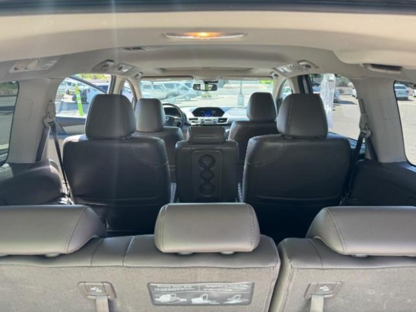 2014 Alabaster Silver Metallic /Beige Honda Odyssey EX-L (5FNRL5H62EB) with an 3.5L V6 SOHC 24V engine, 6-Speed Automatic transmission, located at 1865 East Red Hills Pkwy, St. George, 84770, (435) 628-0023, 37.120850, -113.543640 - We specialize in helping ALL people get the best financing available. No matter your credit score, good, bad or none we can get you an amazing rate. Had a bankruptcy, divorce, or repossessions? We give you the green light to get your credit back on the road. Low down and affordable payments that fit - Photo#25