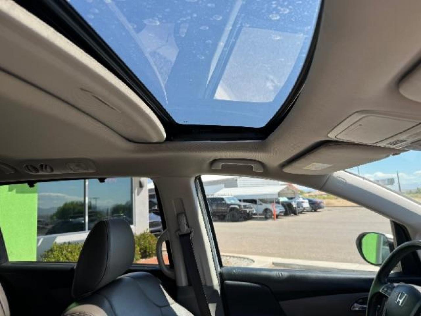 2014 Alabaster Silver Metallic /Beige Honda Odyssey EX-L (5FNRL5H62EB) with an 3.5L V6 SOHC 24V engine, 6-Speed Automatic transmission, located at 1865 East Red Hills Pkwy, St. George, 84770, (435) 628-0023, 37.120850, -113.543640 - We specialize in helping ALL people get the best financing available. No matter your credit score, good, bad or none we can get you an amazing rate. Had a bankruptcy, divorce, or repossessions? We give you the green light to get your credit back on the road. Low down and affordable payments that fit - Photo#37