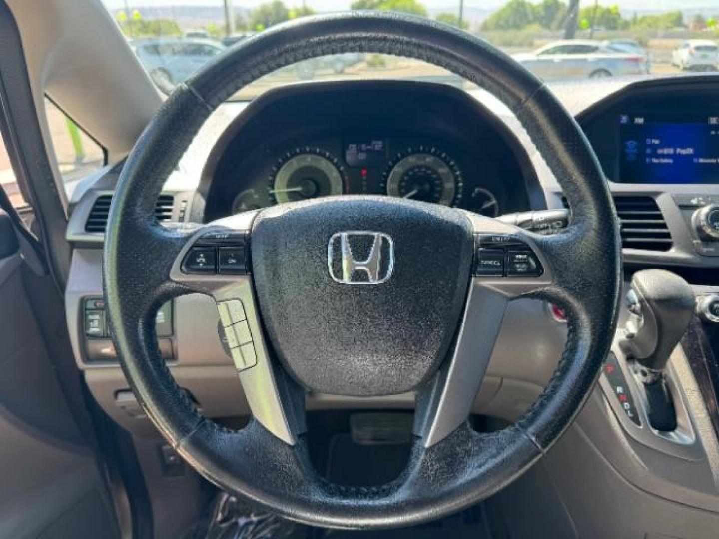 2014 Alabaster Silver Metallic /Beige Honda Odyssey EX-L (5FNRL5H62EB) with an 3.5L V6 SOHC 24V engine, 6-Speed Automatic transmission, located at 1865 East Red Hills Pkwy, St. George, 84770, (435) 628-0023, 37.120850, -113.543640 - We specialize in helping ALL people get the best financing available. No matter your credit score, good, bad or none we can get you an amazing rate. Had a bankruptcy, divorce, or repossessions? We give you the green light to get your credit back on the road. Low down and affordable payments that fit - Photo#17