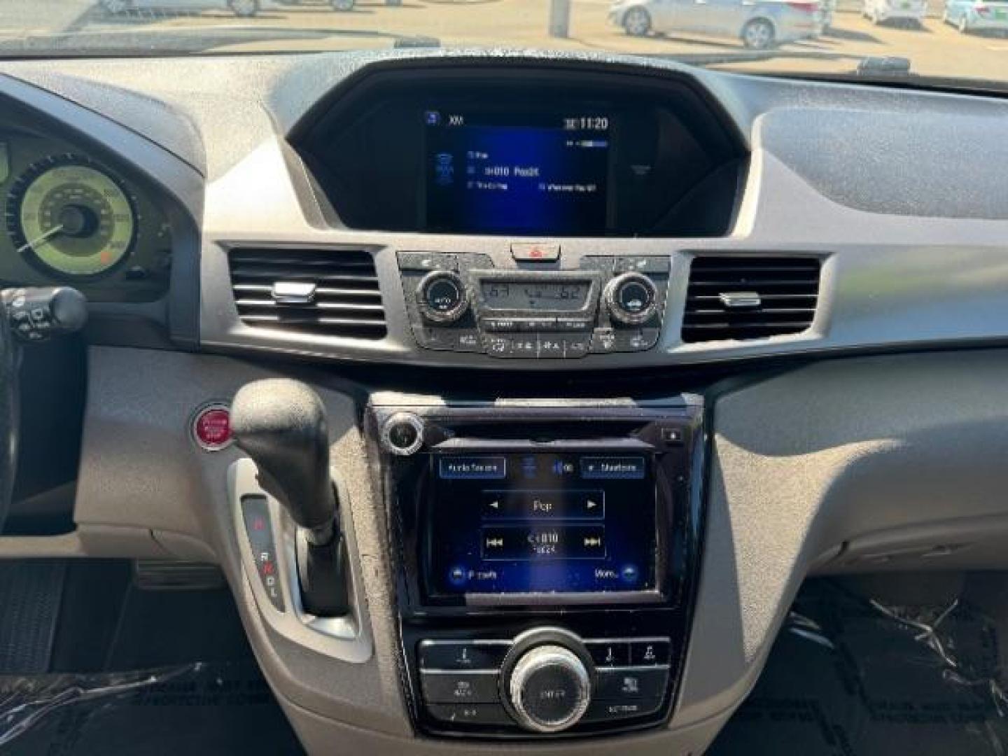 2014 Alabaster Silver Metallic /Beige Honda Odyssey EX-L (5FNRL5H62EB) with an 3.5L V6 SOHC 24V engine, 6-Speed Automatic transmission, located at 1865 East Red Hills Pkwy, St. George, 84770, (435) 628-0023, 37.120850, -113.543640 - We specialize in helping ALL people get the best financing available. No matter your credit score, good, bad or none we can get you an amazing rate. Had a bankruptcy, divorce, or repossessions? We give you the green light to get your credit back on the road. Low down and affordable payments that fit - Photo#18