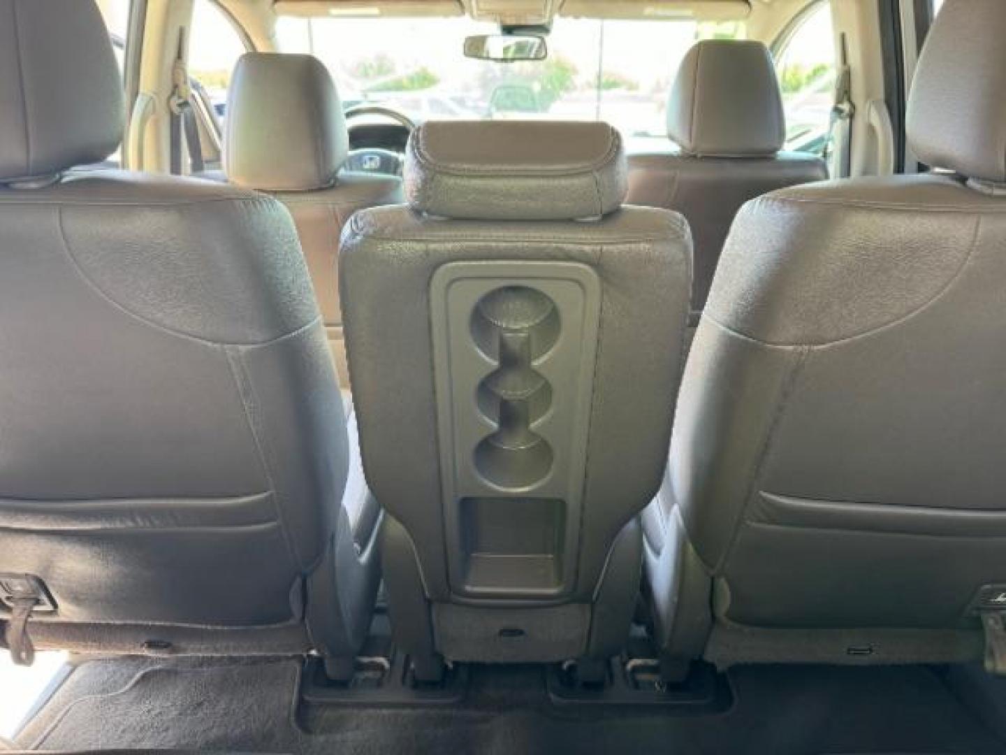 2014 Alabaster Silver Metallic /Beige Honda Odyssey EX-L (5FNRL5H62EB) with an 3.5L V6 SOHC 24V engine, 6-Speed Automatic transmission, located at 1865 East Red Hills Pkwy, St. George, 84770, (435) 628-0023, 37.120850, -113.543640 - We specialize in helping ALL people get the best financing available. No matter your credit score, good, bad or none we can get you an amazing rate. Had a bankruptcy, divorce, or repossessions? We give you the green light to get your credit back on the road. Low down and affordable payments that fit - Photo#28