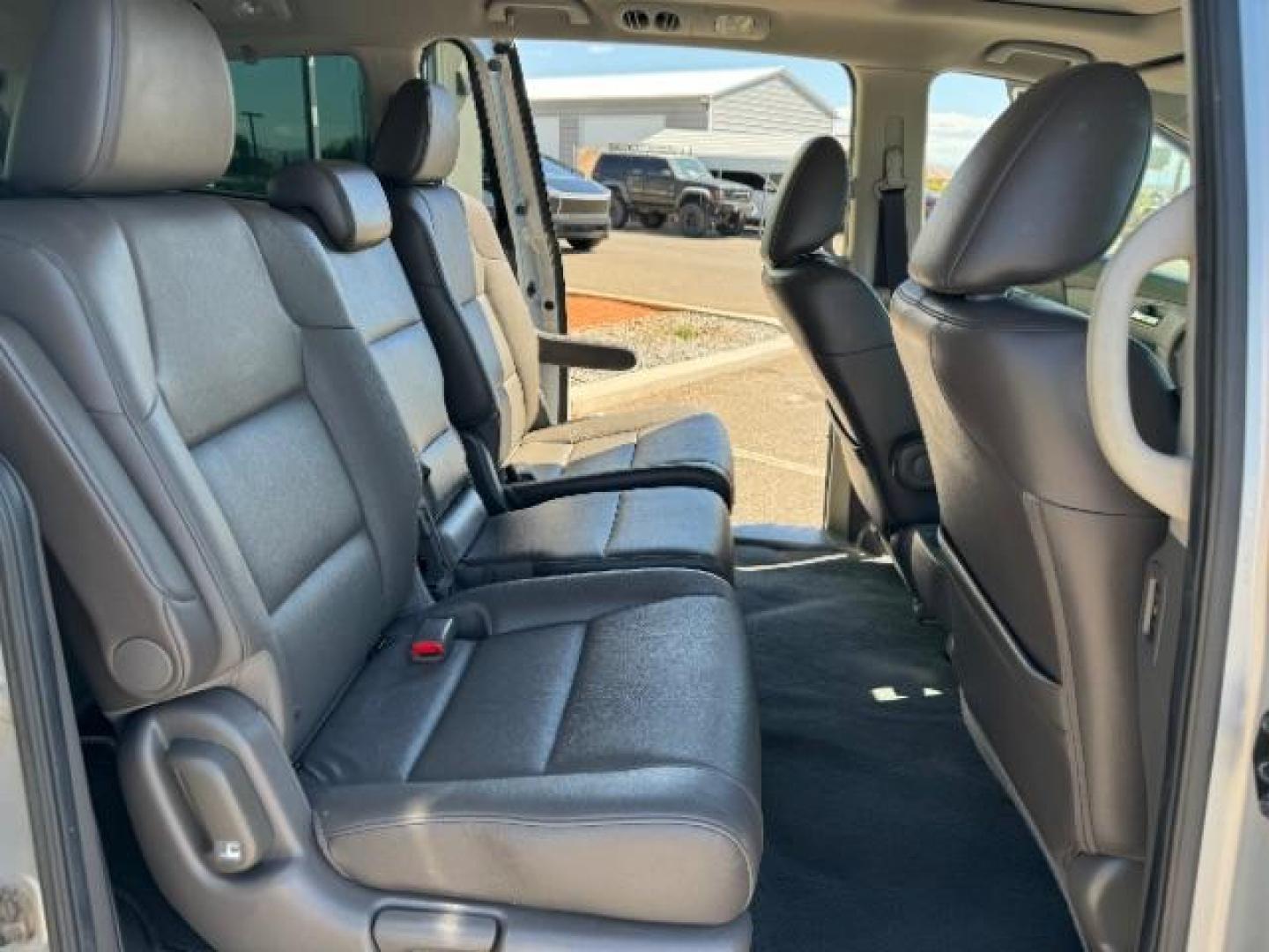 2014 Alabaster Silver Metallic /Beige Honda Odyssey EX-L (5FNRL5H62EB) with an 3.5L V6 SOHC 24V engine, 6-Speed Automatic transmission, located at 1865 East Red Hills Pkwy, St. George, 84770, (435) 628-0023, 37.120850, -113.543640 - We specialize in helping ALL people get the best financing available. No matter your credit score, good, bad or none we can get you an amazing rate. Had a bankruptcy, divorce, or repossessions? We give you the green light to get your credit back on the road. Low down and affordable payments that fit - Photo#30