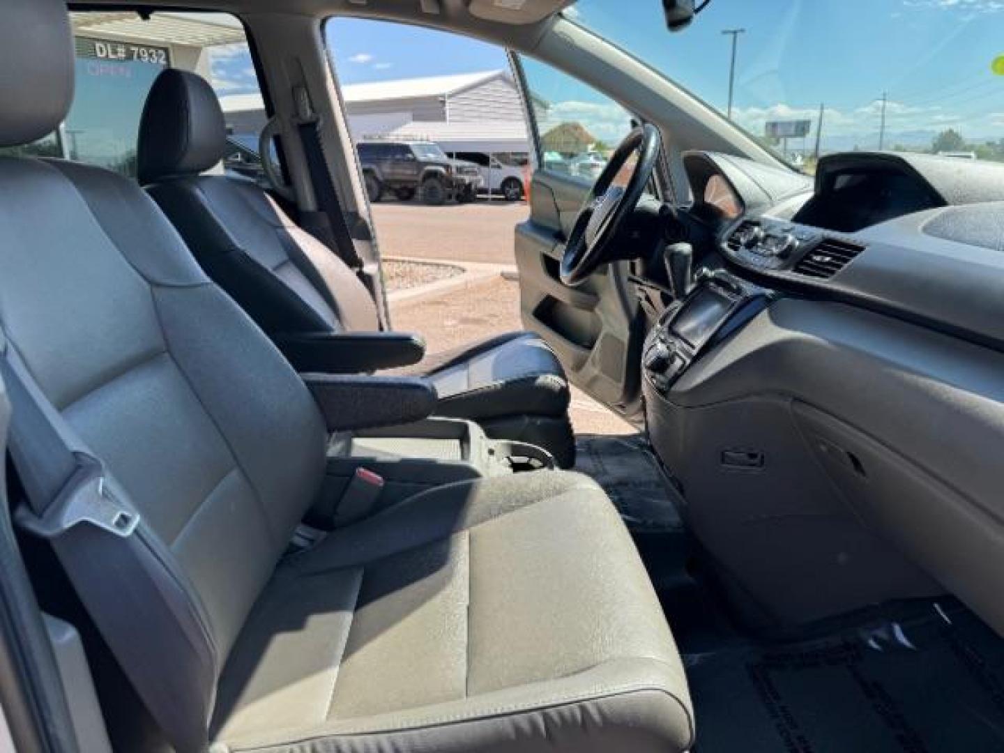 2014 Alabaster Silver Metallic /Beige Honda Odyssey EX-L (5FNRL5H62EB) with an 3.5L V6 SOHC 24V engine, 6-Speed Automatic transmission, located at 1865 East Red Hills Pkwy, St. George, 84770, (435) 628-0023, 37.120850, -113.543640 - We specialize in helping ALL people get the best financing available. No matter your credit score, good, bad or none we can get you an amazing rate. Had a bankruptcy, divorce, or repossessions? We give you the green light to get your credit back on the road. Low down and affordable payments that fit - Photo#34