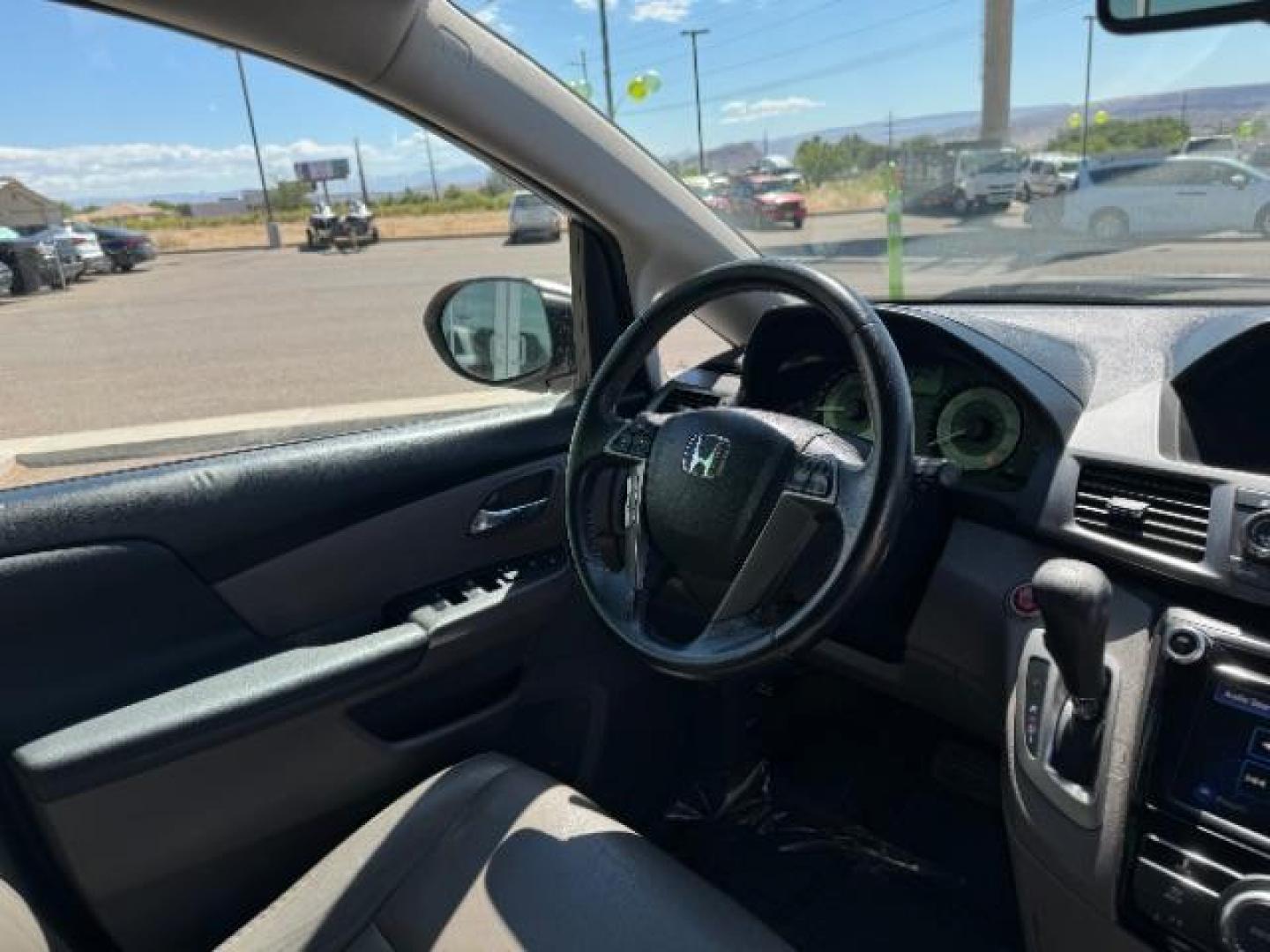 2014 Alabaster Silver Metallic /Beige Honda Odyssey EX-L (5FNRL5H62EB) with an 3.5L V6 SOHC 24V engine, 6-Speed Automatic transmission, located at 1865 East Red Hills Pkwy, St. George, 84770, (435) 628-0023, 37.120850, -113.543640 - We specialize in helping ALL people get the best financing available. No matter your credit score, good, bad or none we can get you an amazing rate. Had a bankruptcy, divorce, or repossessions? We give you the green light to get your credit back on the road. Low down and affordable payments that fit - Photo#36